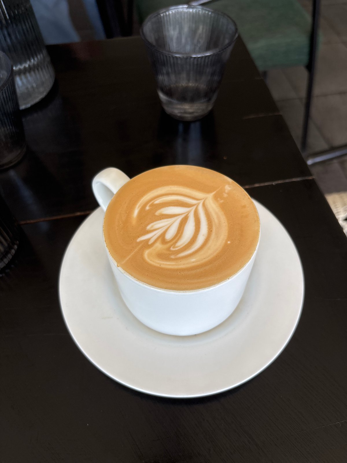 Early morning latte art documented at Kuta Selatan cafe