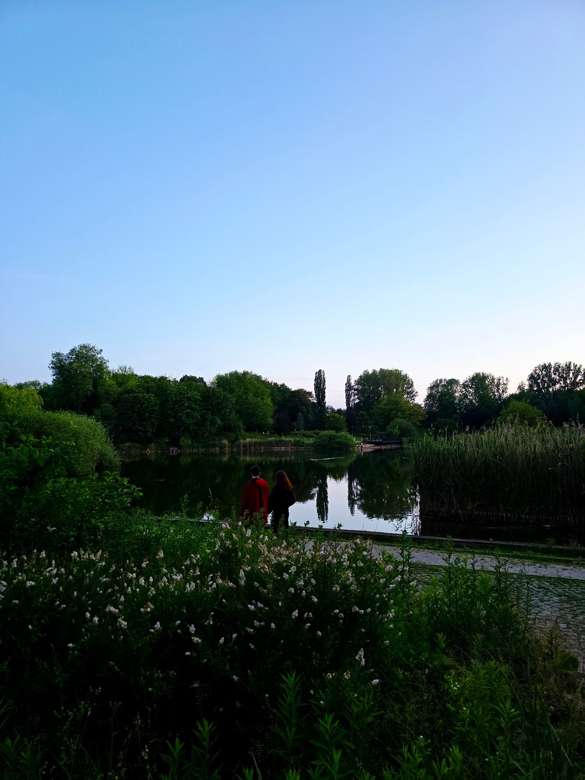 Golden hour in Warsaw's parks, water, and skyline
