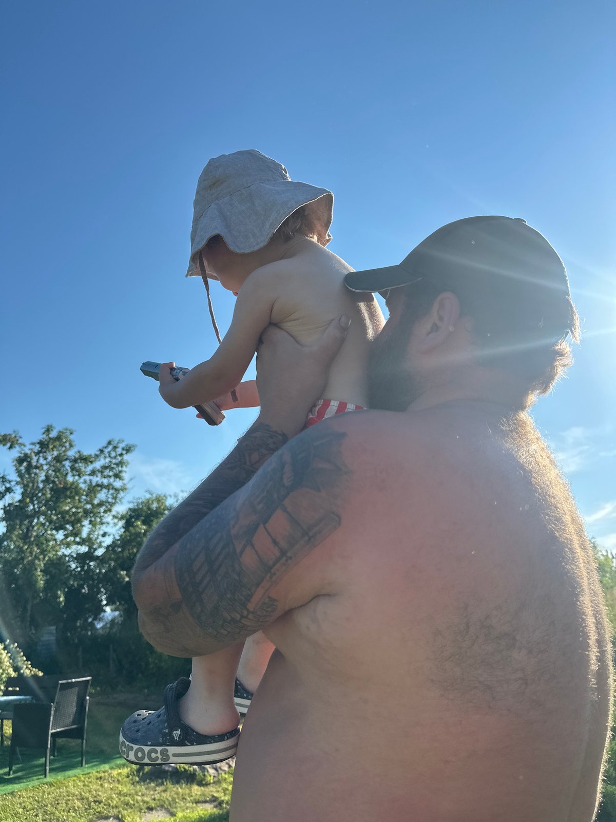 Backyard summer day with a paddling pool in Галево