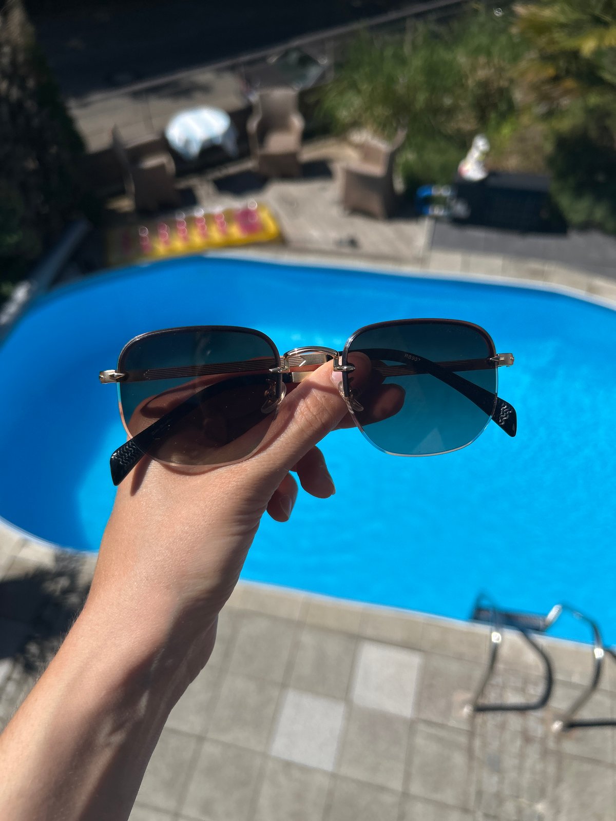 Poolside sunglasses photographed in Heilbronn swimming facility