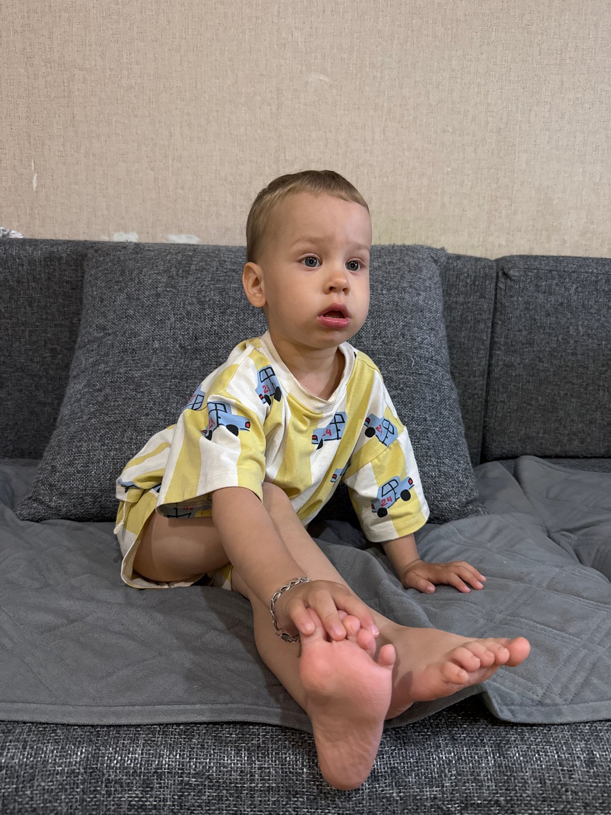 Baby photographed on sofa in Russian village