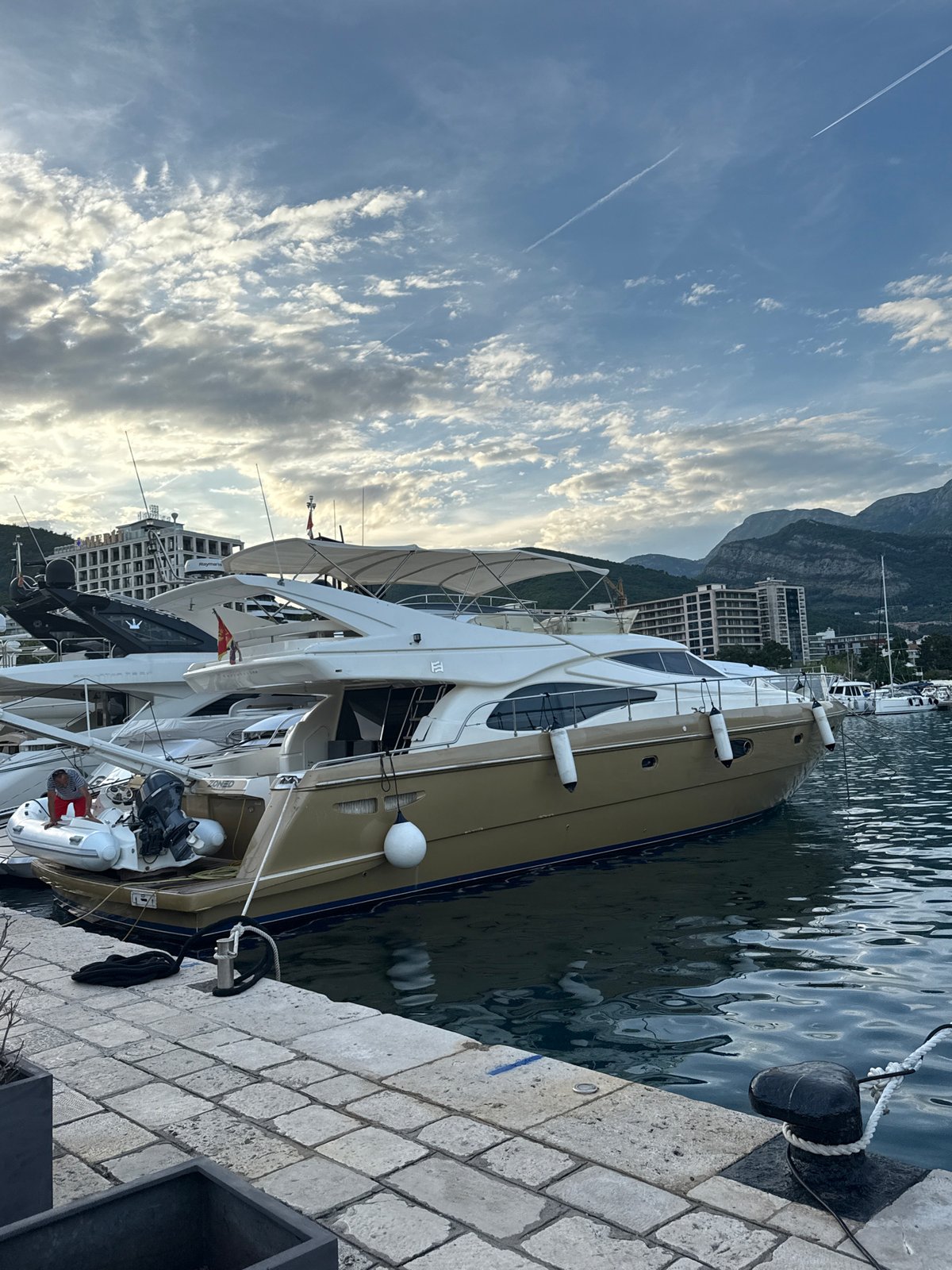 Women perform synchronized dance on Budva marina promenade