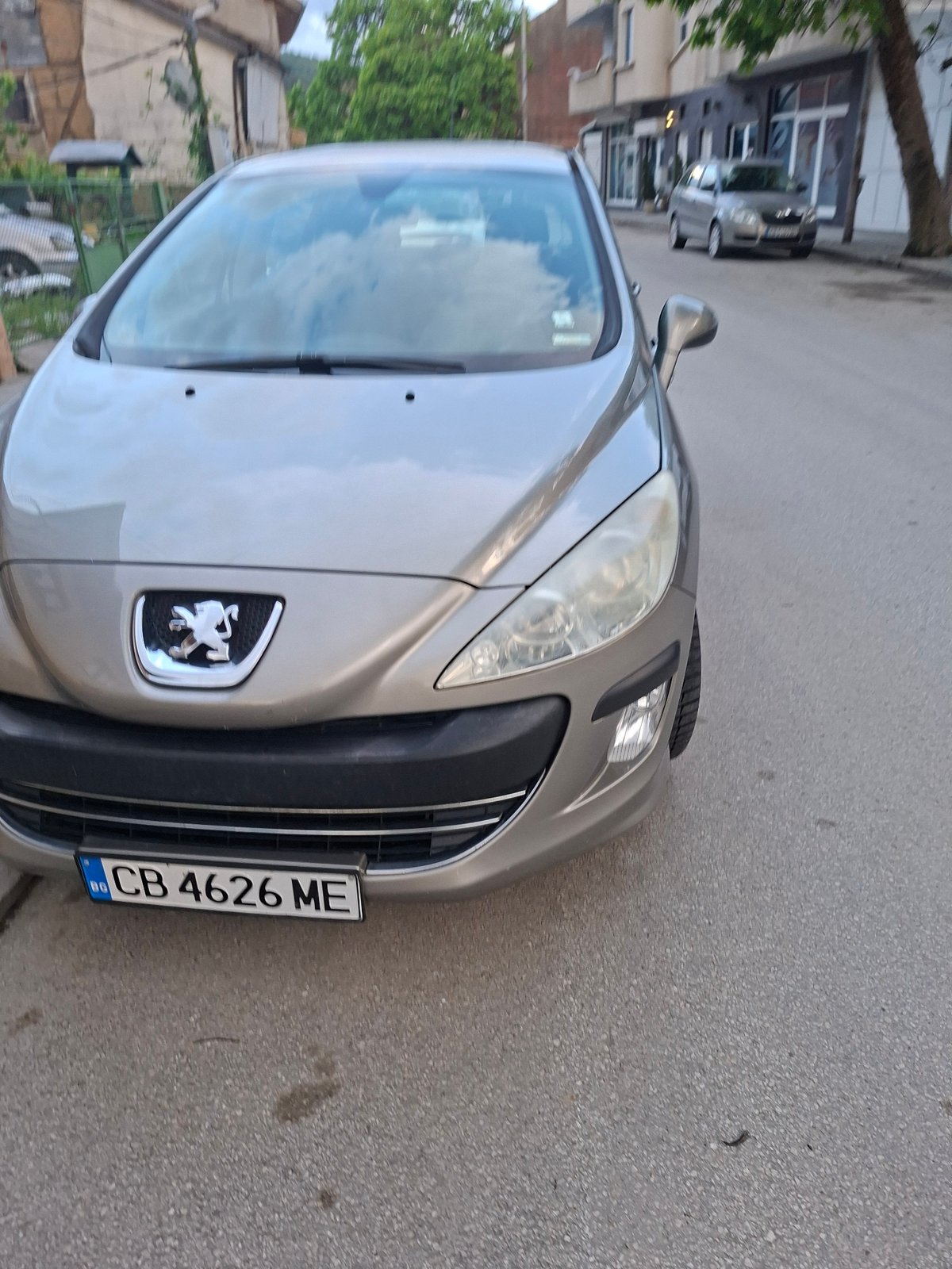 Parked car and bicycle shop observed in Gabrovo, Bulgaria