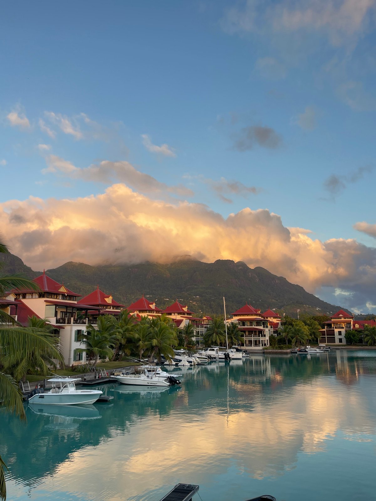 Tranquil canal and docked boats in Providence, Seychelles