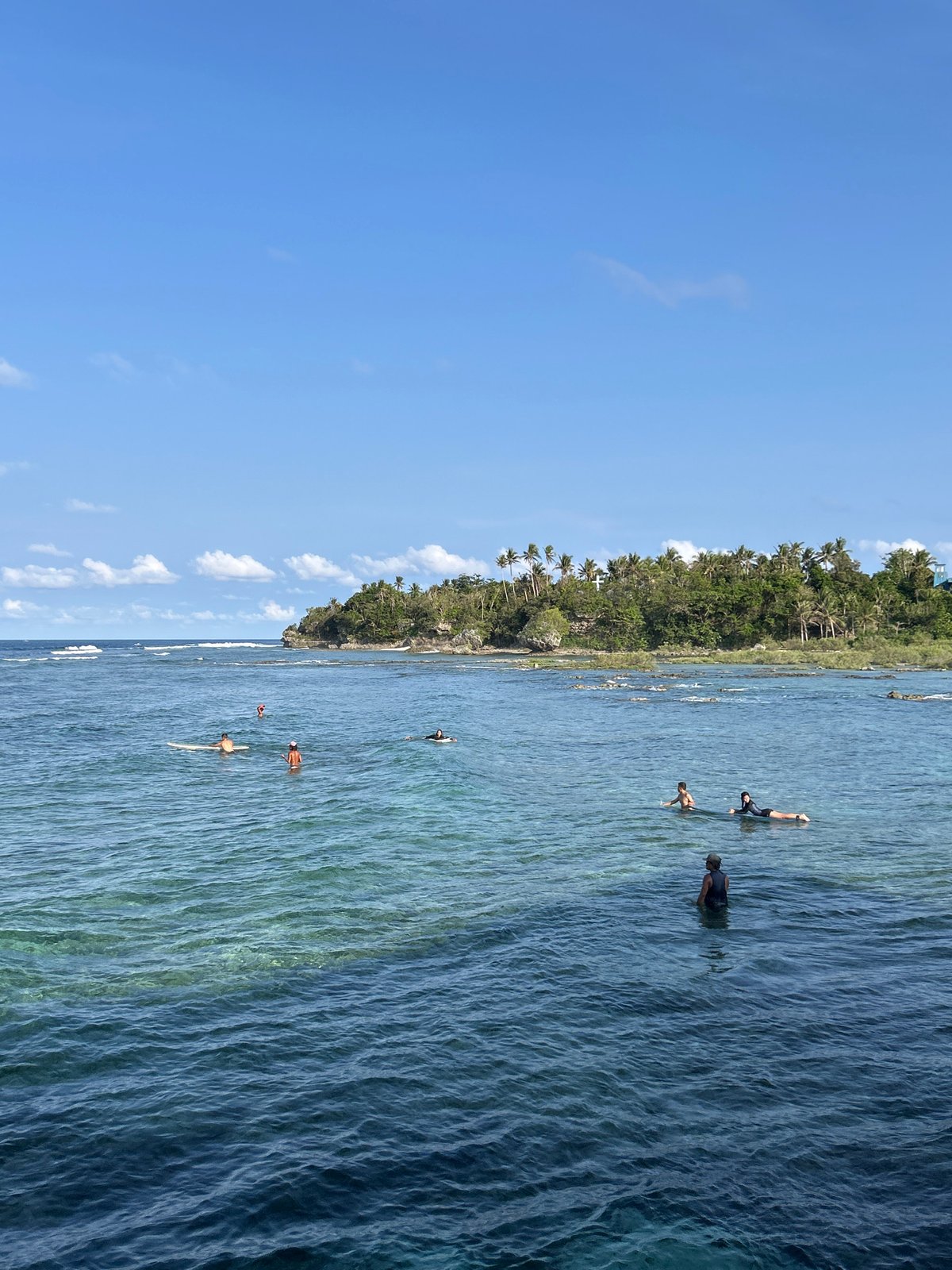 Morning beach activities captured at General Luna coastal waters