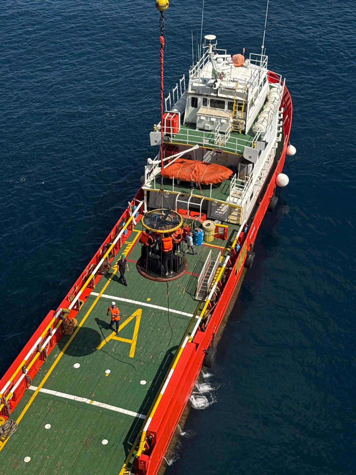 Offshore supply vessel conducts personnel transfer operation at sea