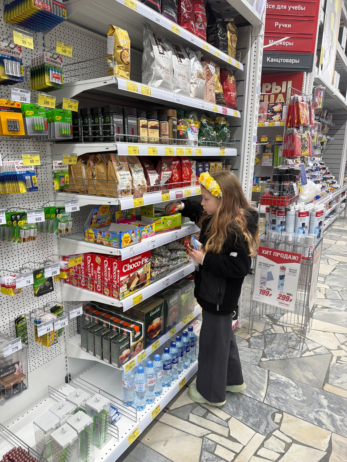 Young shopper spotted in Chaikovsky supermarket aisle