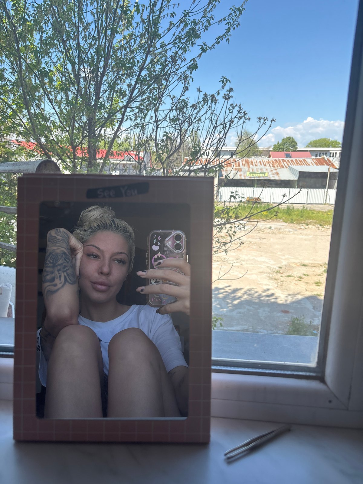 Woman takes mirror selfies in Plovdiv, Bulgaria