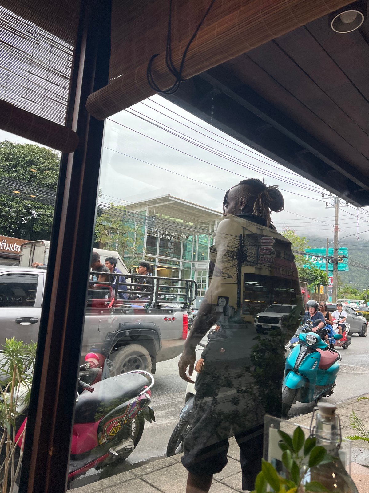 Woman visits health food cafe in Baan Lamai Thailand