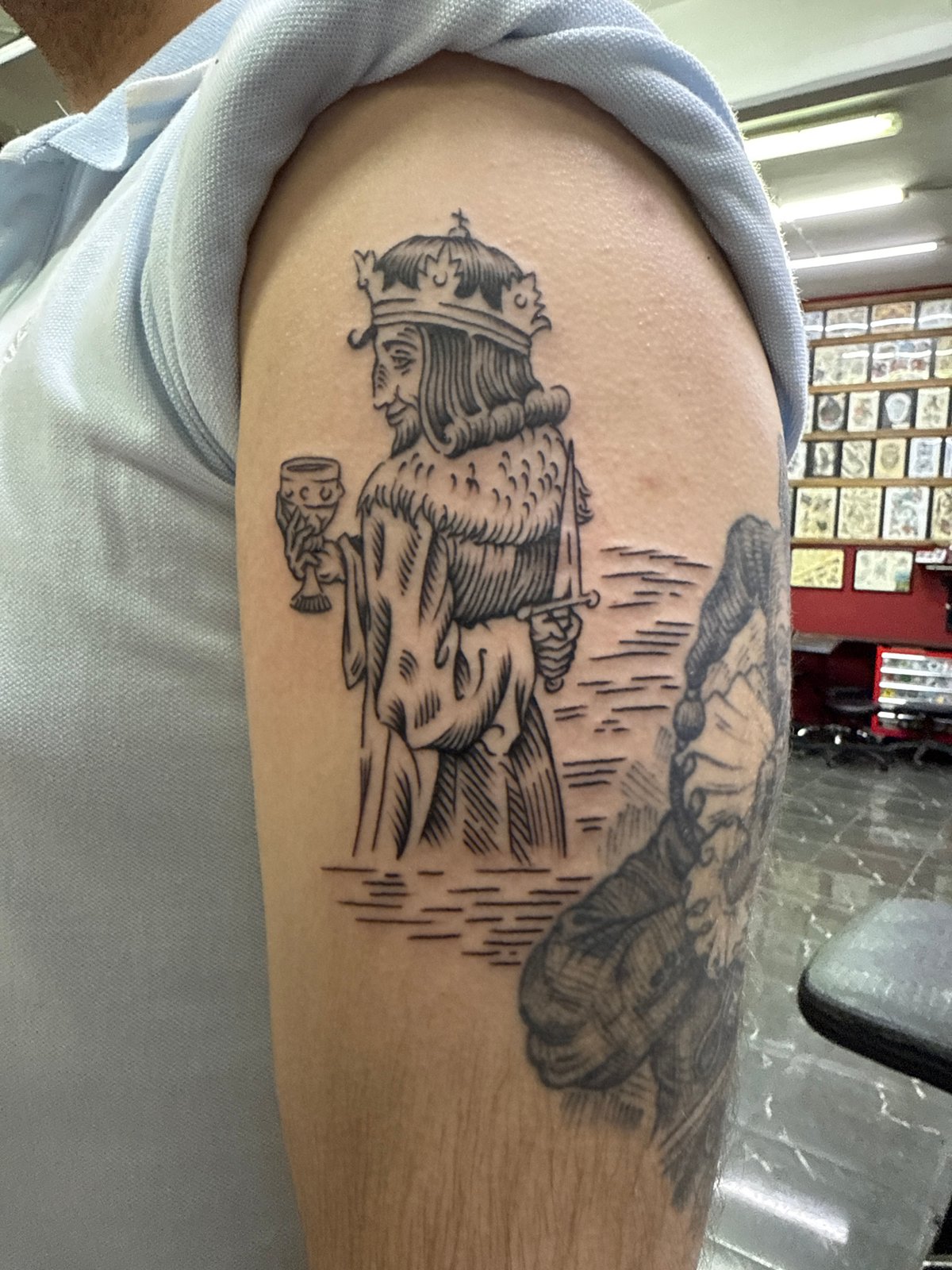 Person documents fresh tattoo collection in Moscow afternoon session