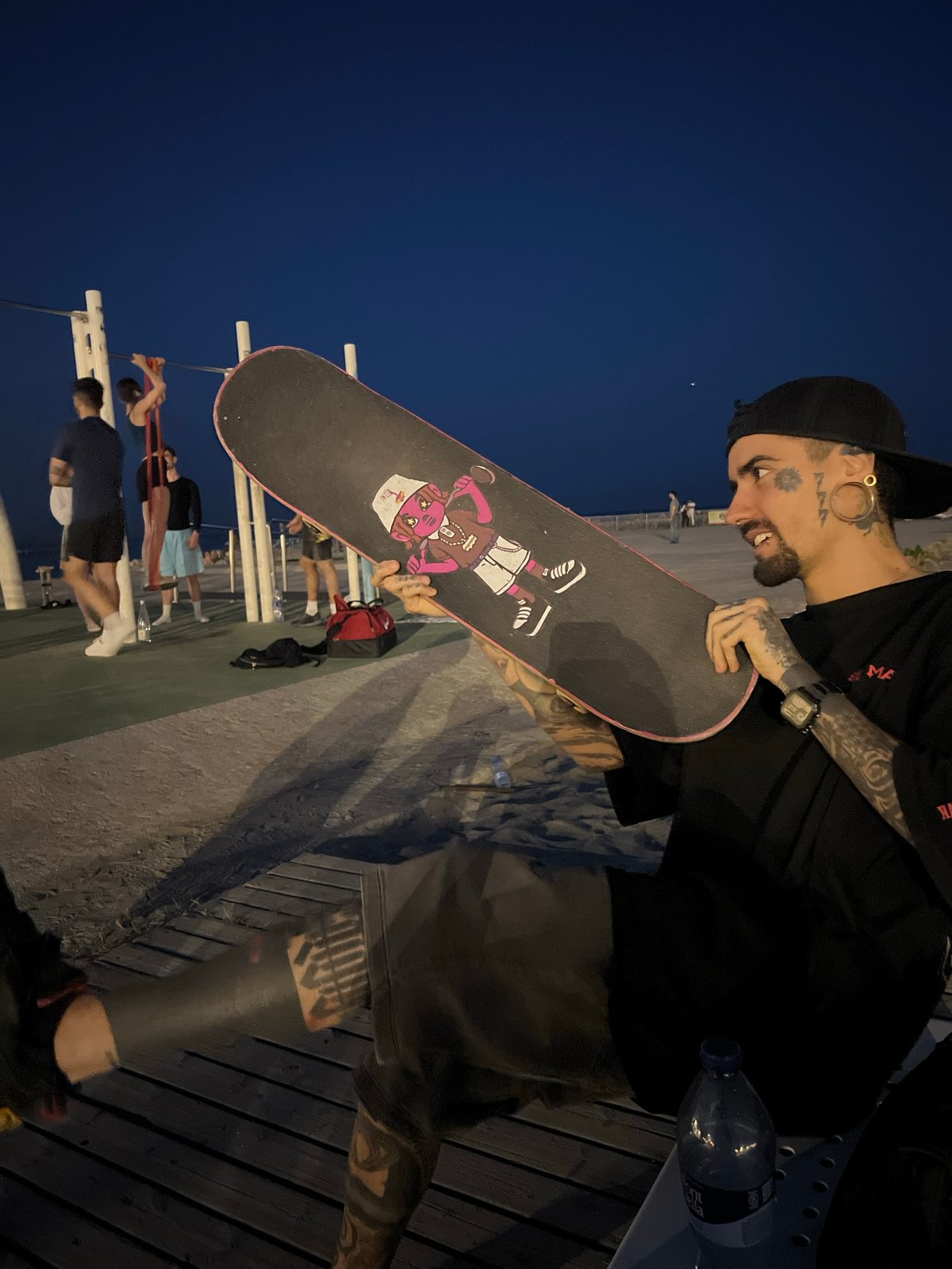 Evening workout session at Barcelona waterfront public gym