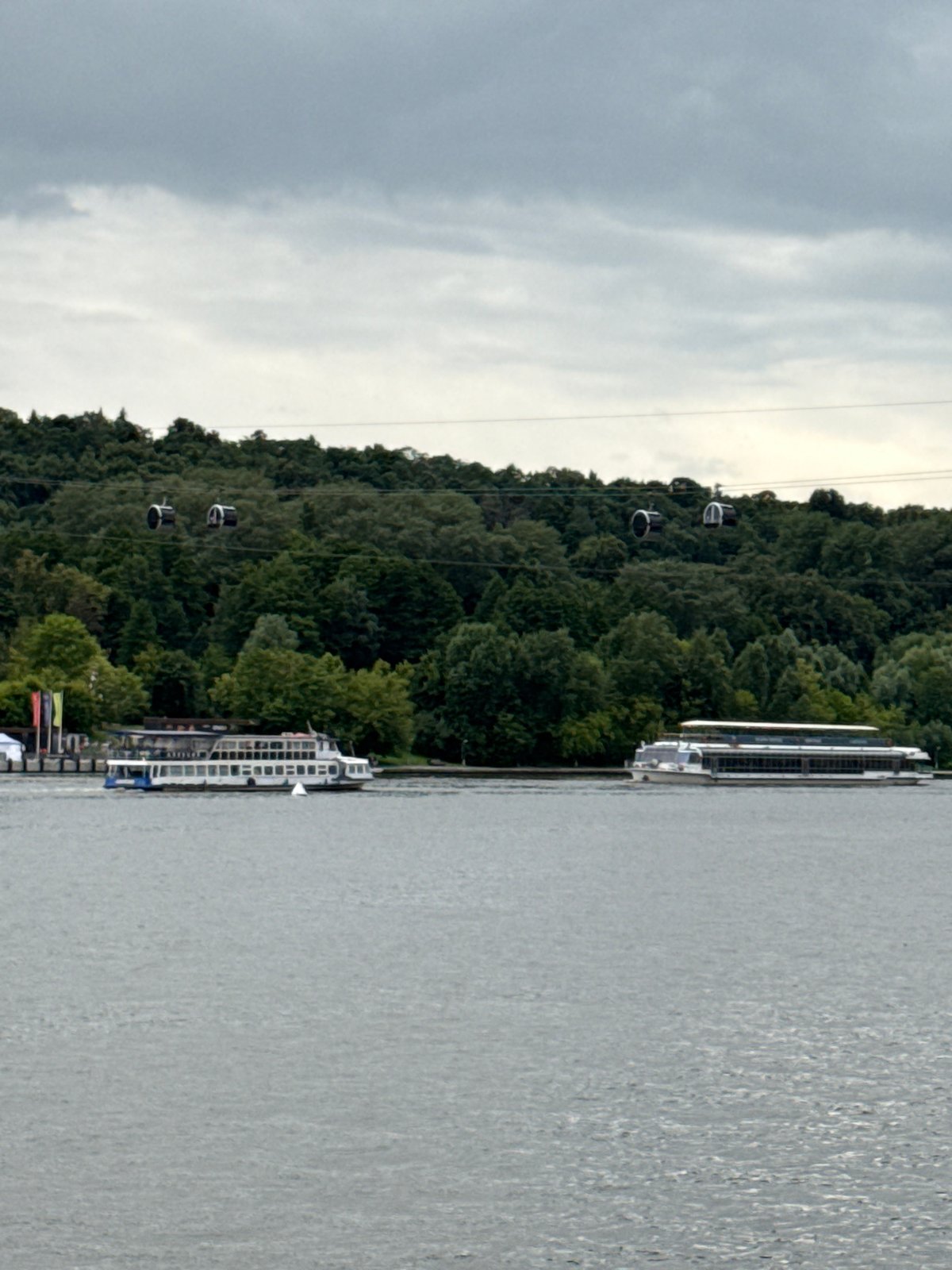 Boats, cable cars, and joggers along Moscow's Sparrow Hills waterfront