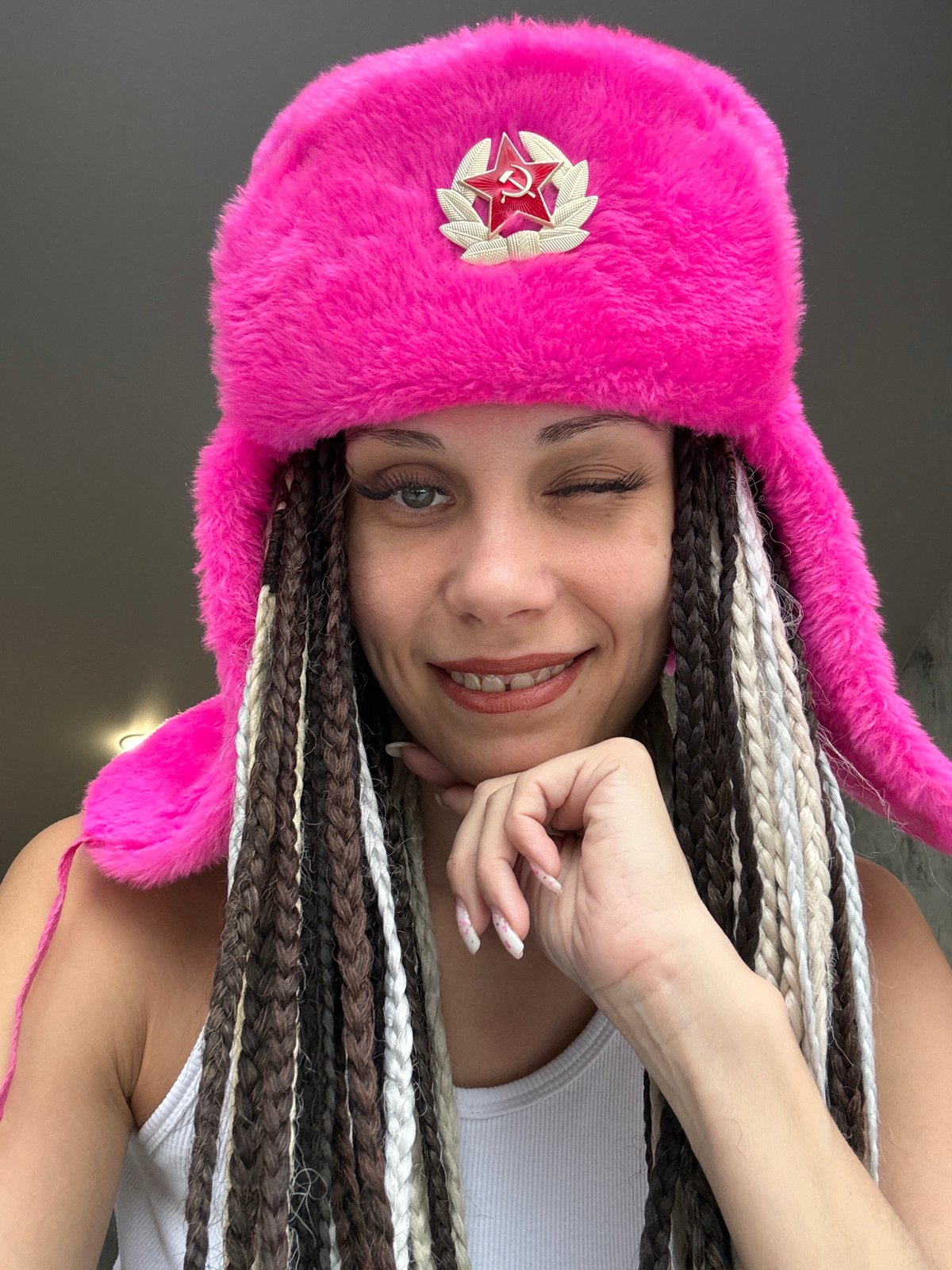 Person spotted wearing pink Soviet-star hat in Russia