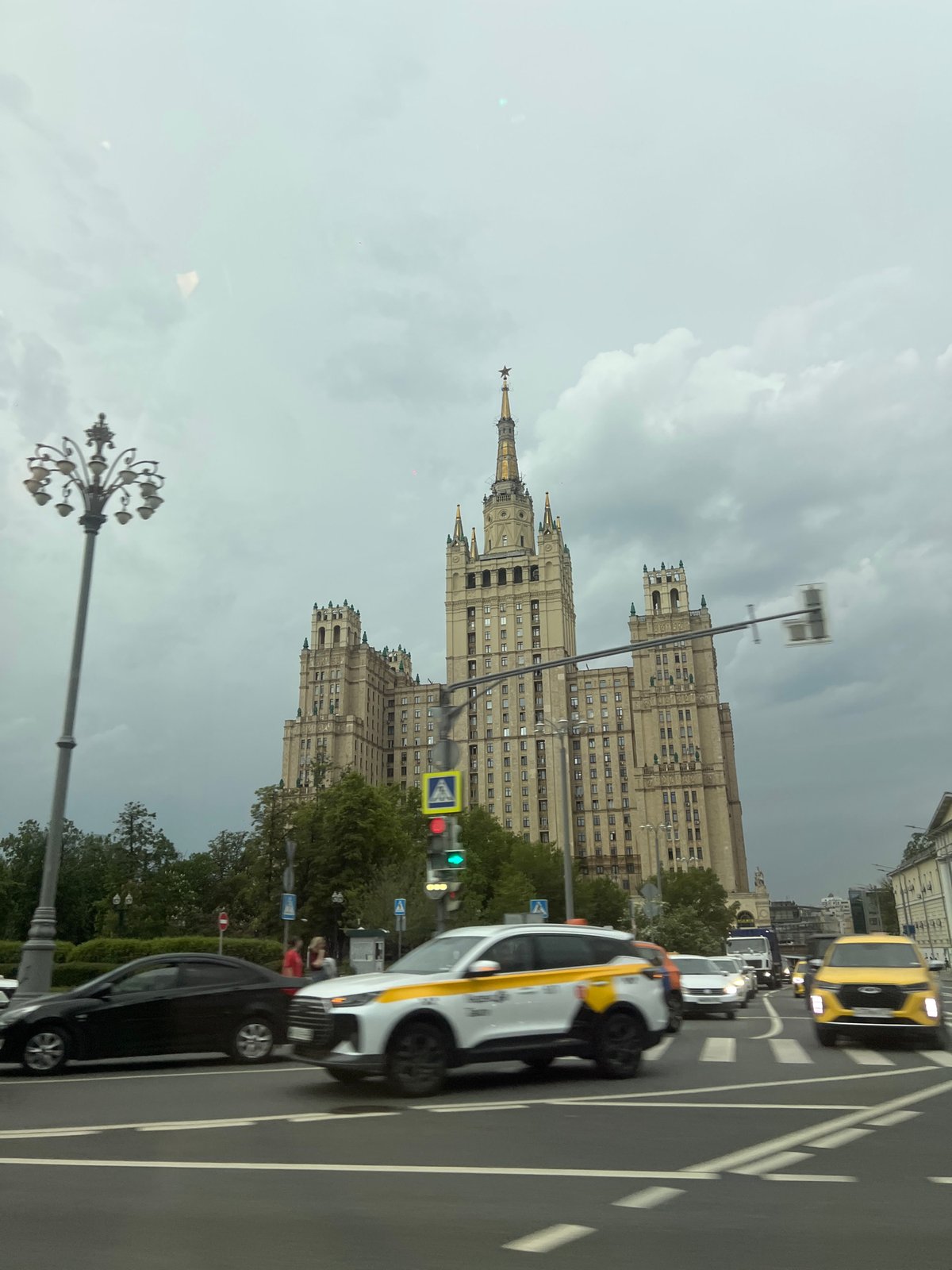 Moscow's Kotelnicheskaya Embankment Building photographed under cloudy skies