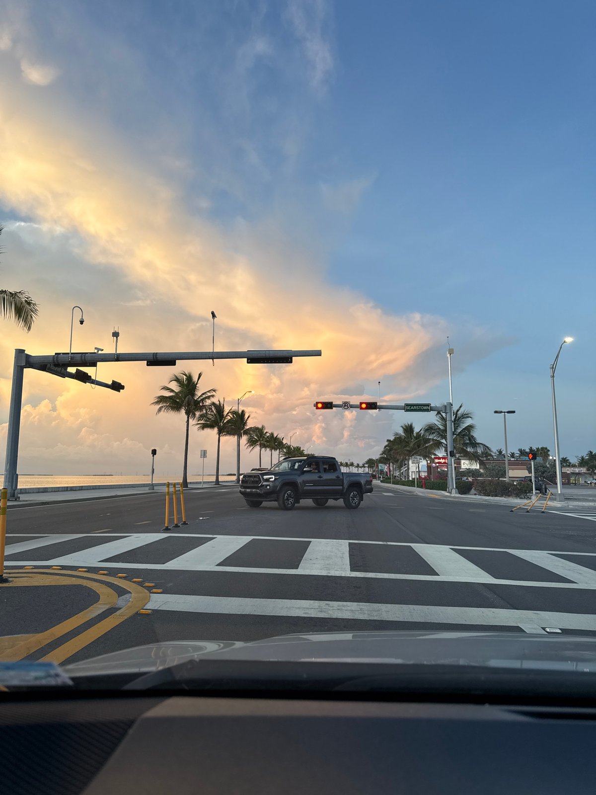 Sunset cruise down Key West's coastal Roosevelt Boulevard