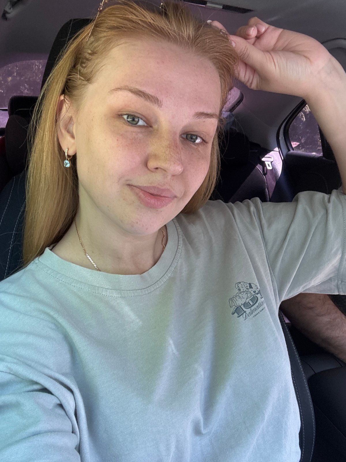 Woman photographed in car and outdoors in Yaroslavl