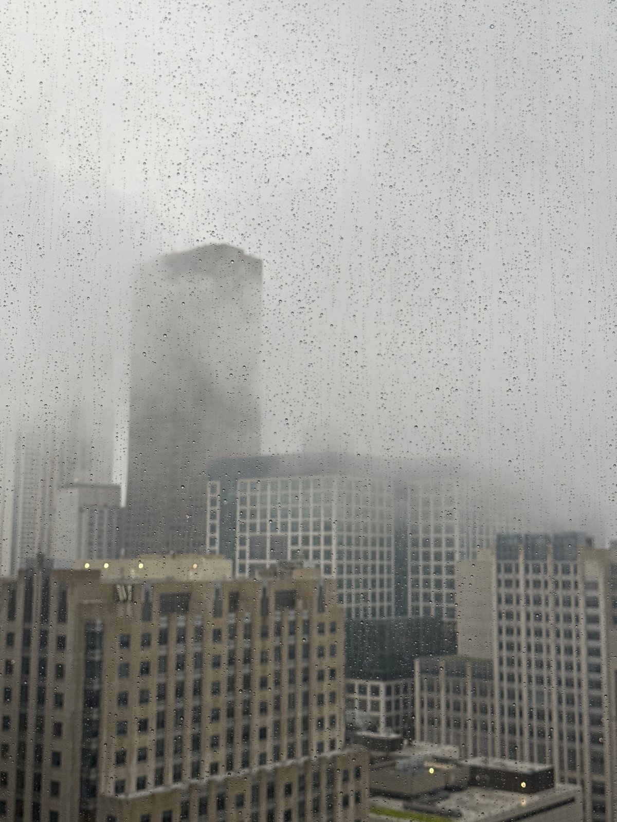 Chicago skyline disappears into fog and rain on July 4th
