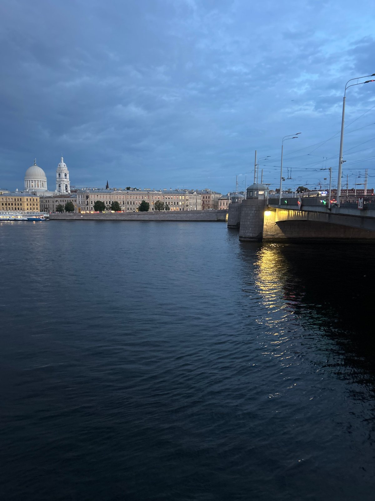 Evening waterfront scenes captured across urban river district