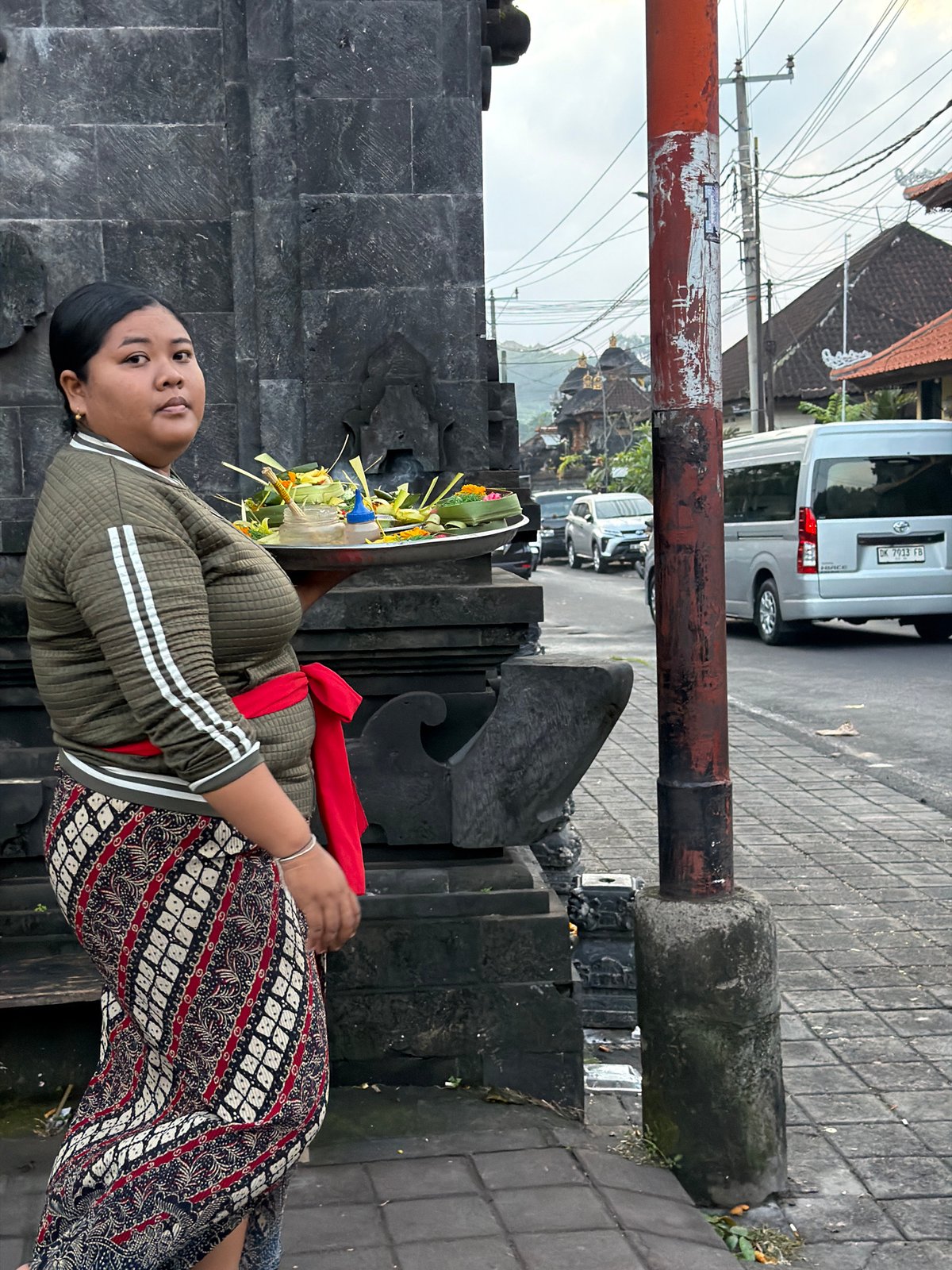 Balinese temple compound in Manggis with offerings and ornate architecture