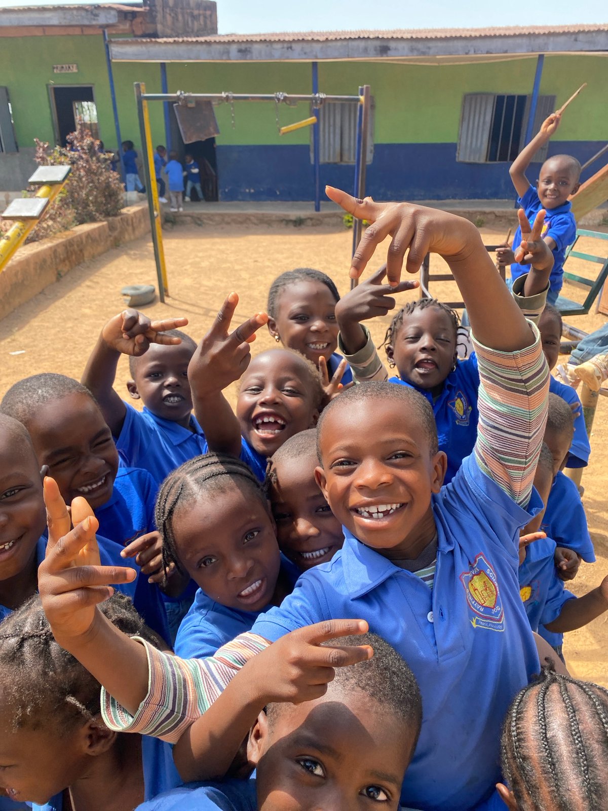 School children gather for photos in Gura Top, Nigeria