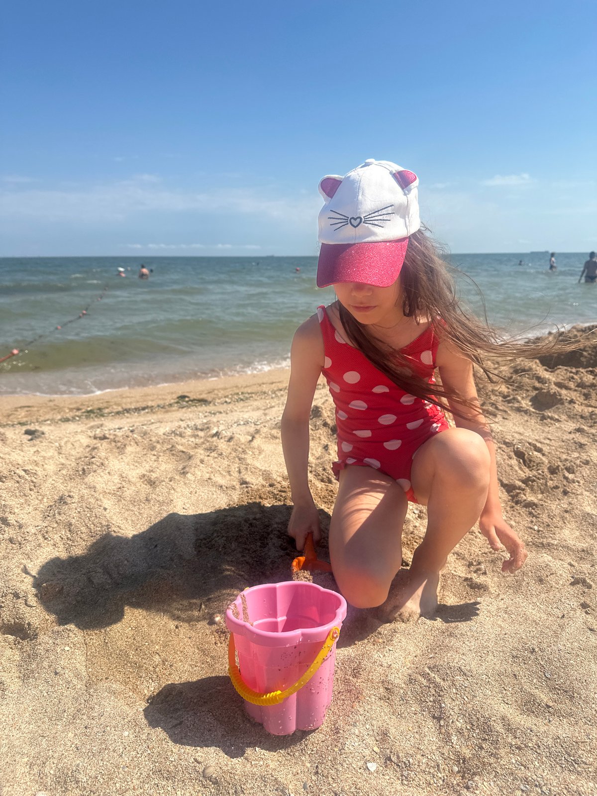 Relaxed summer morning on the Golubitskaya beach.