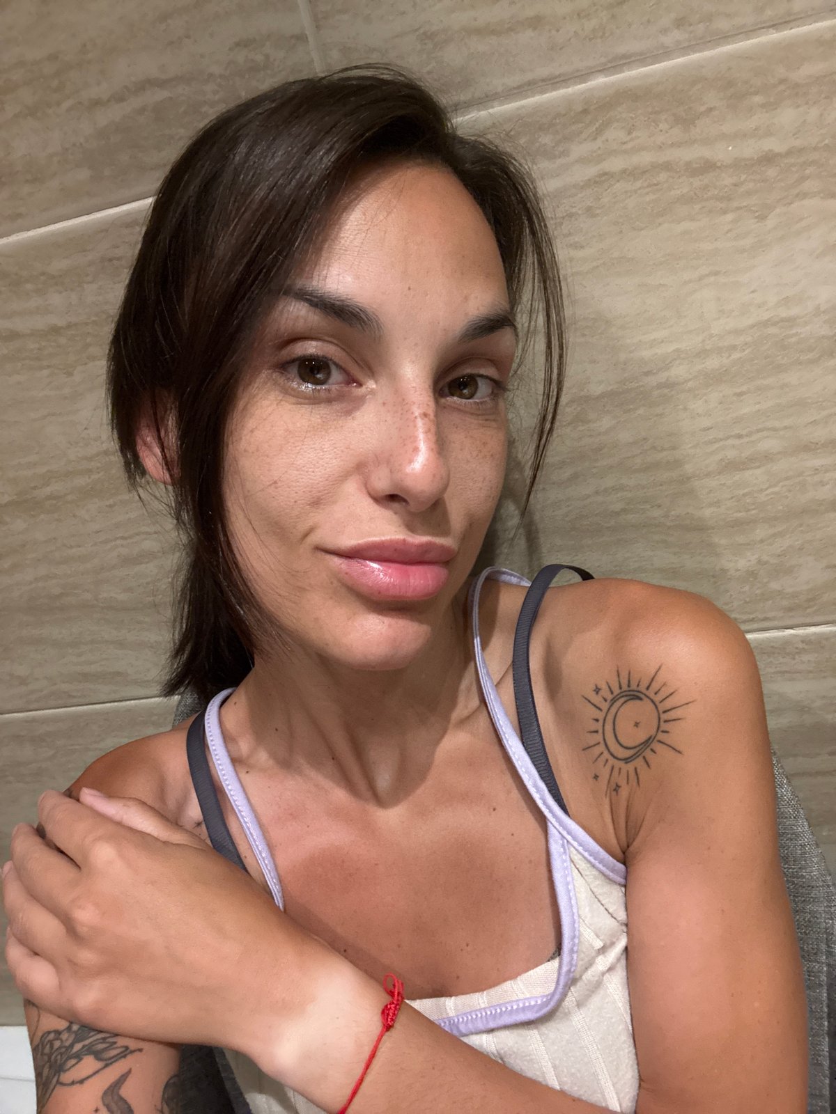 Portrait with crescent moon and sun tattoo, Aksu, Turkey