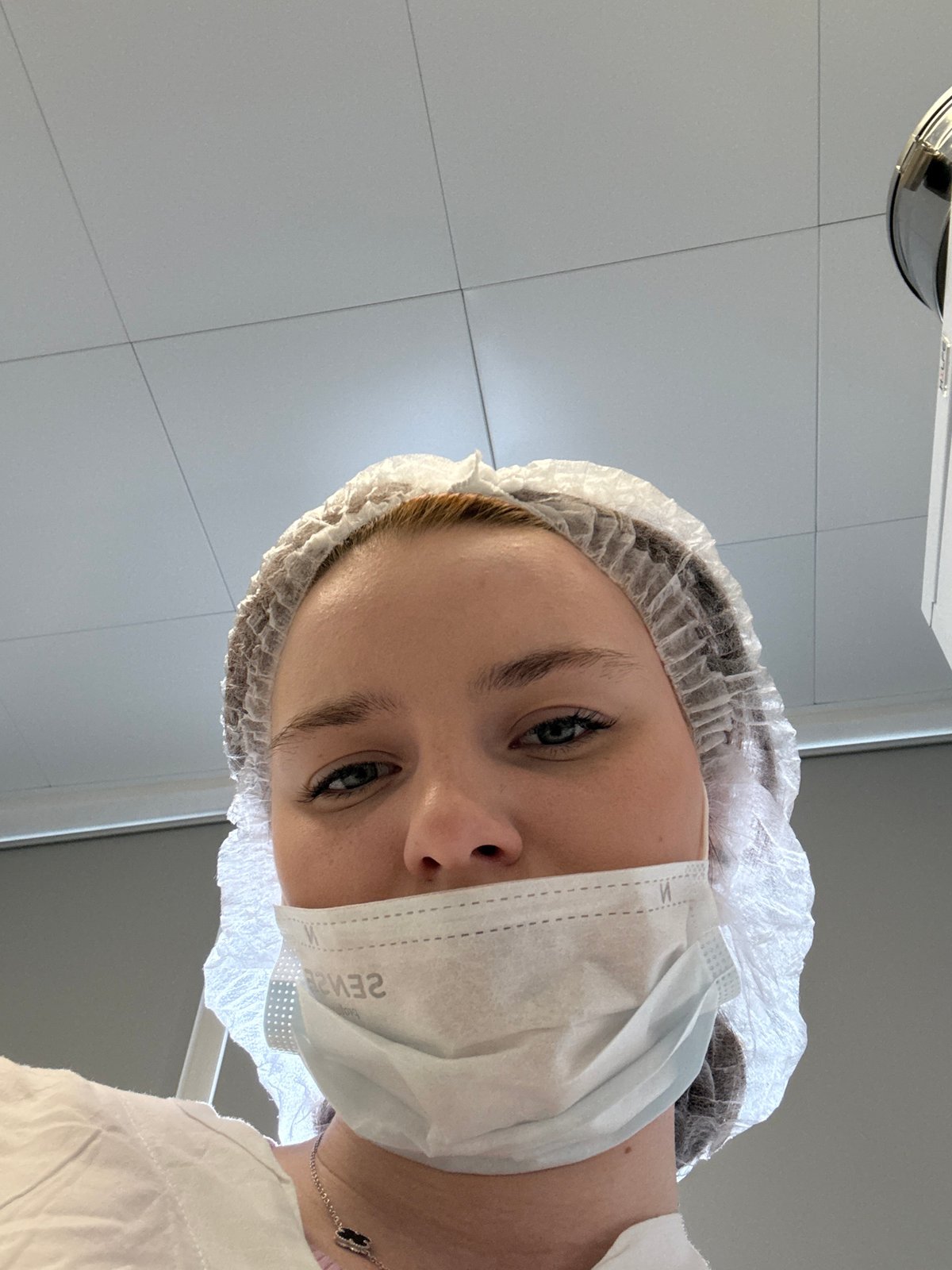 Medical professional documented during routine procedure in Saint Petersburg laboratory