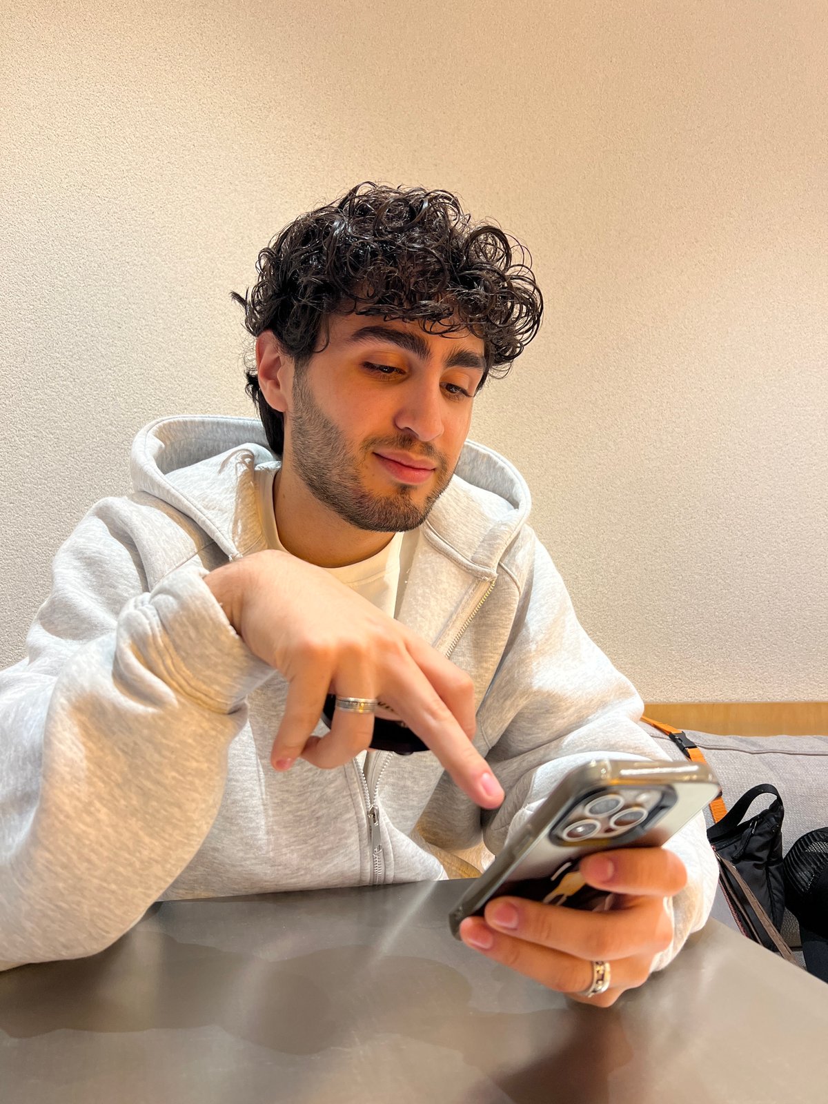 Young man documents restaurant visit through selfies in Yerevan