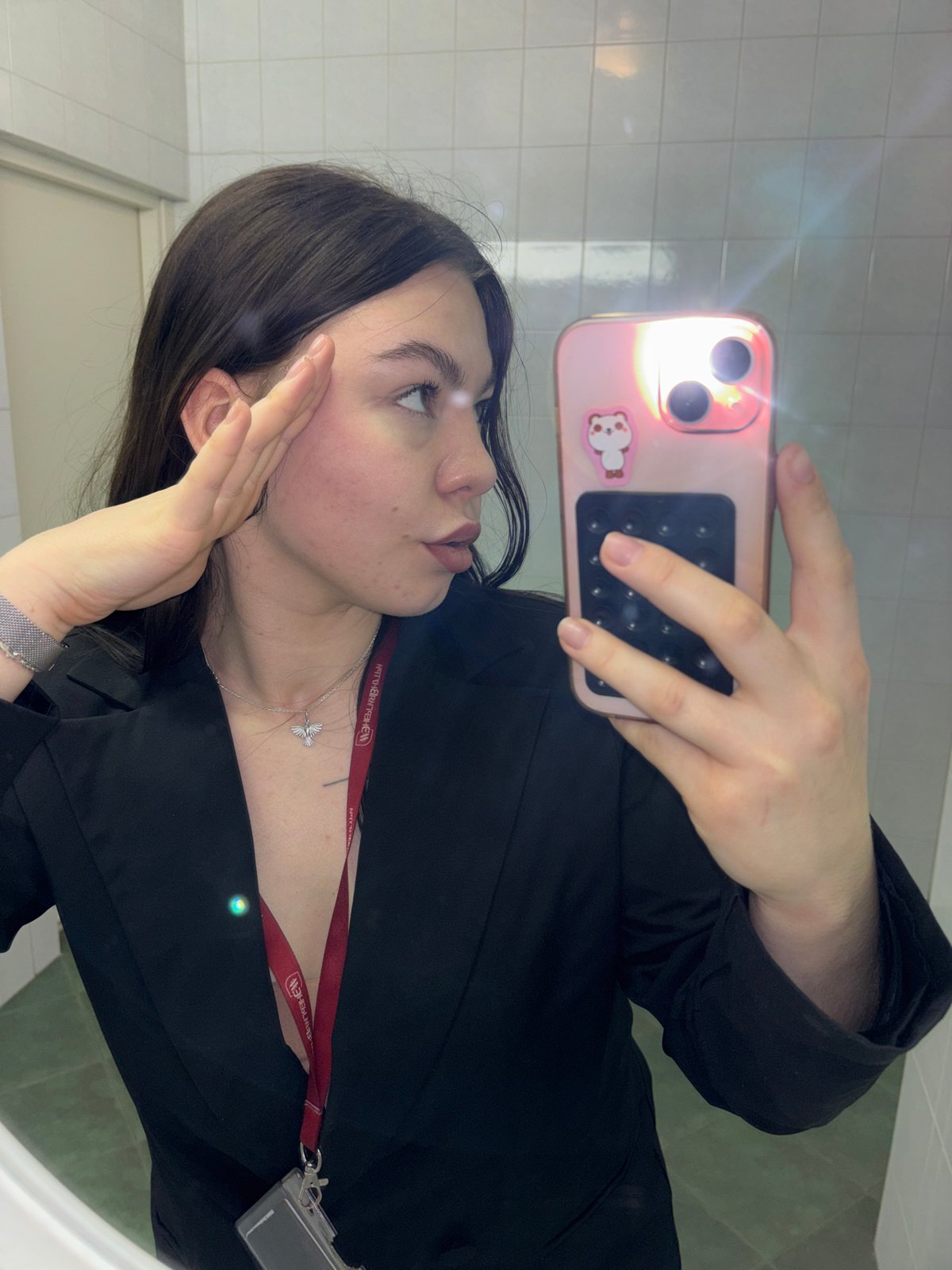 Woman takes morning selfie in Perm bathroom mirror