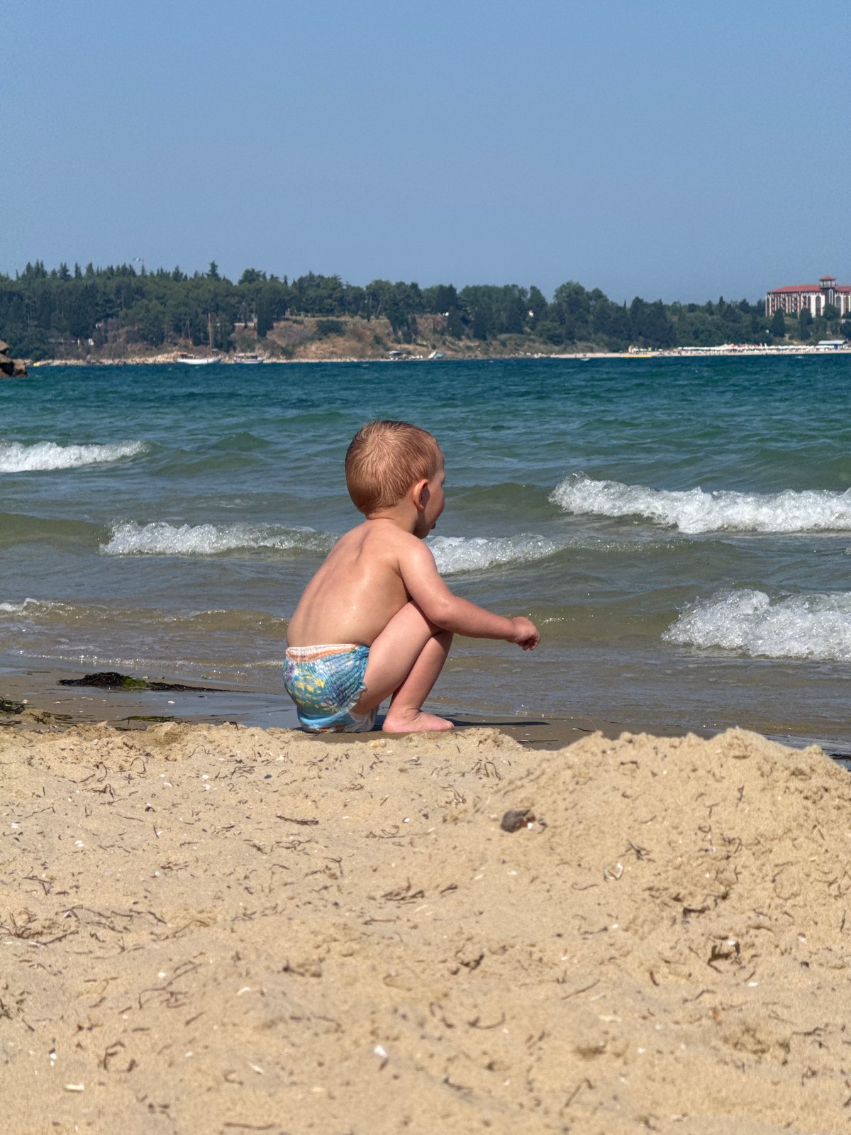 Lazy summer afternoon on the Black Sea beach in Ravda