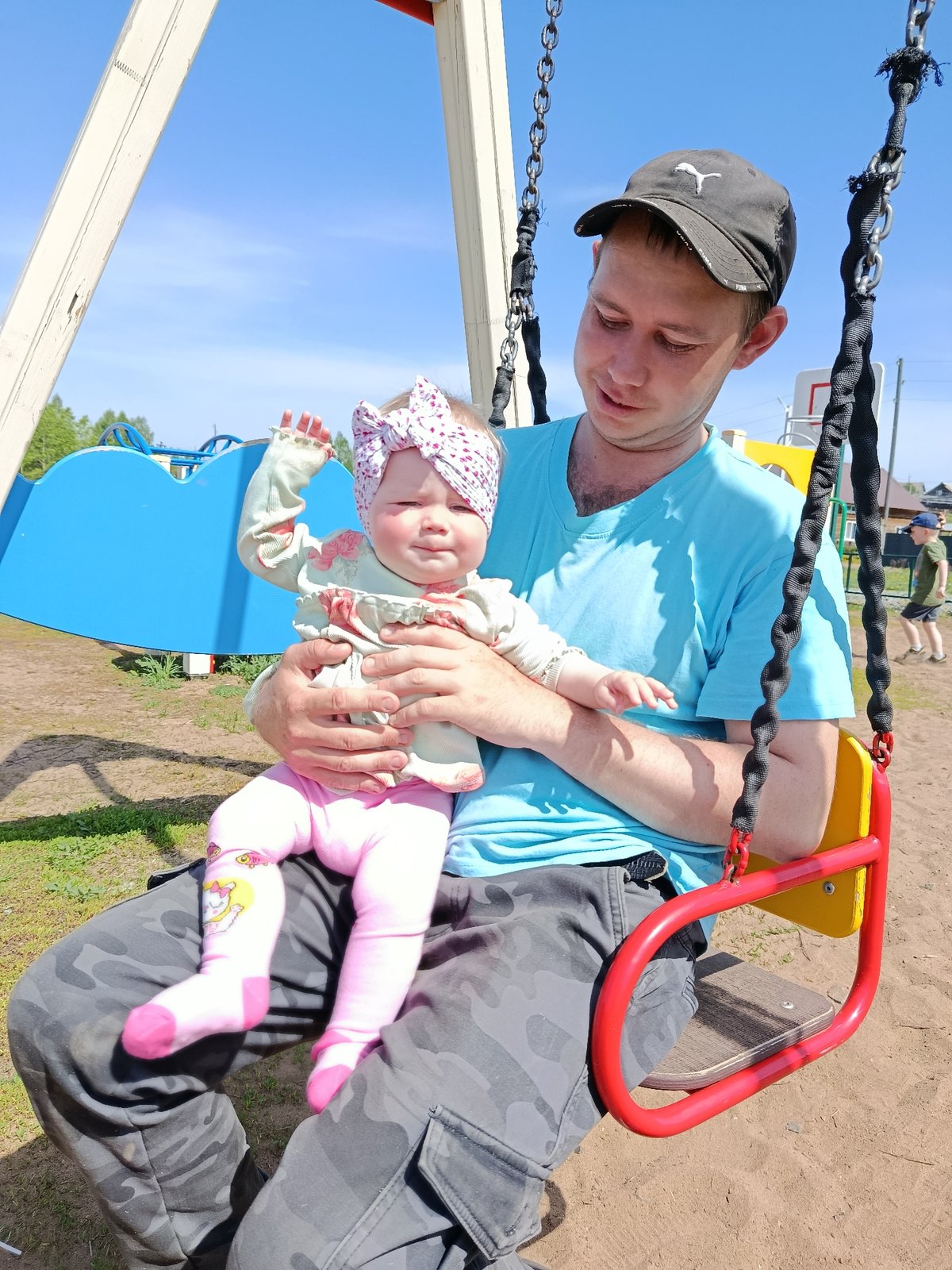 Family enjoys morning playground visit in Фоки, Russia