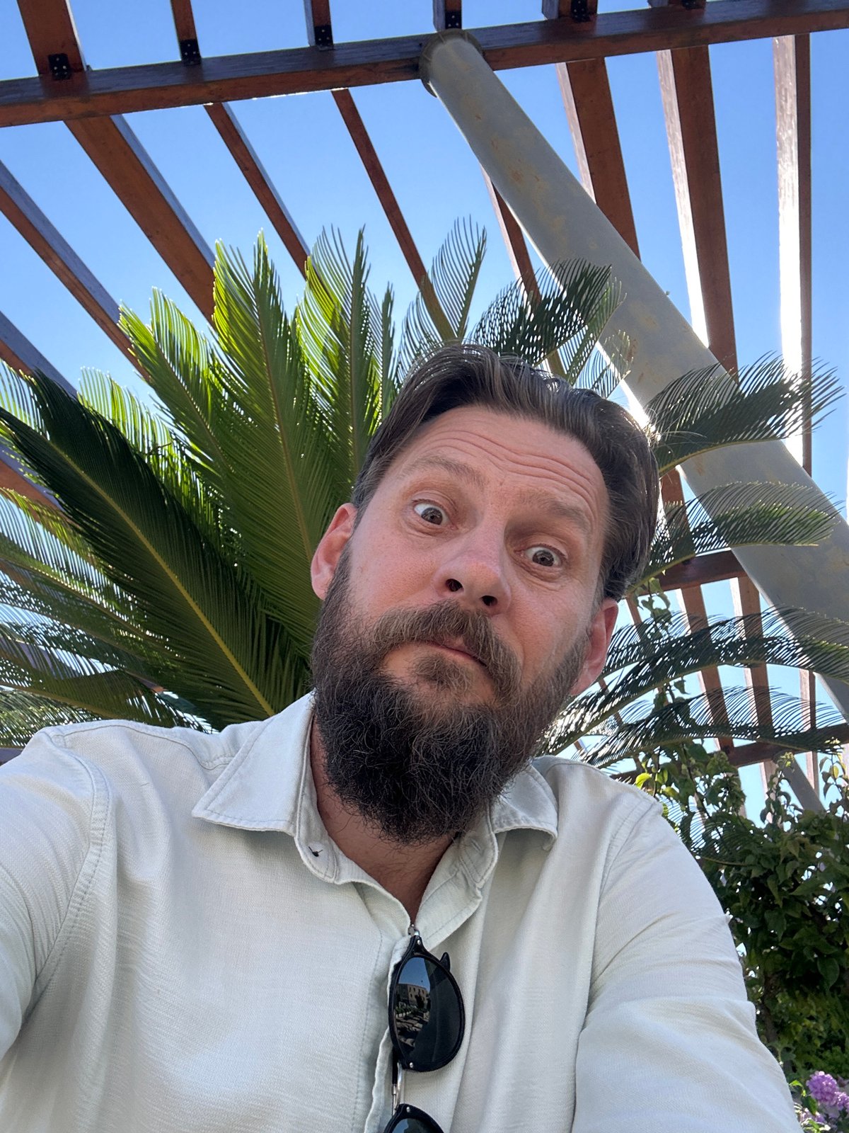 Man explores terraced outdoor venue in sunny Fethiye, Turkey