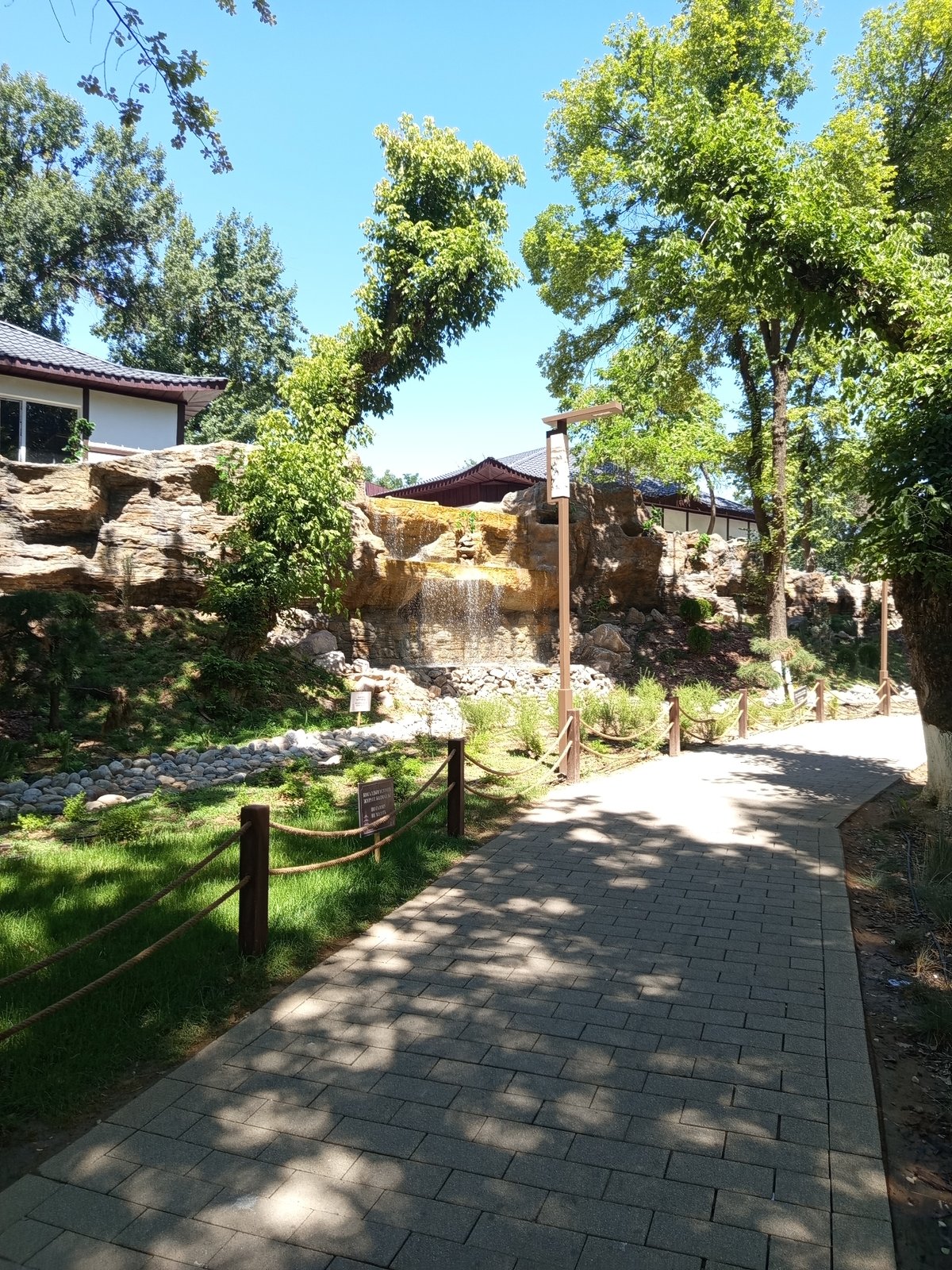 Shymkent park waterfall, koi pond, and Japanese pavilion explored