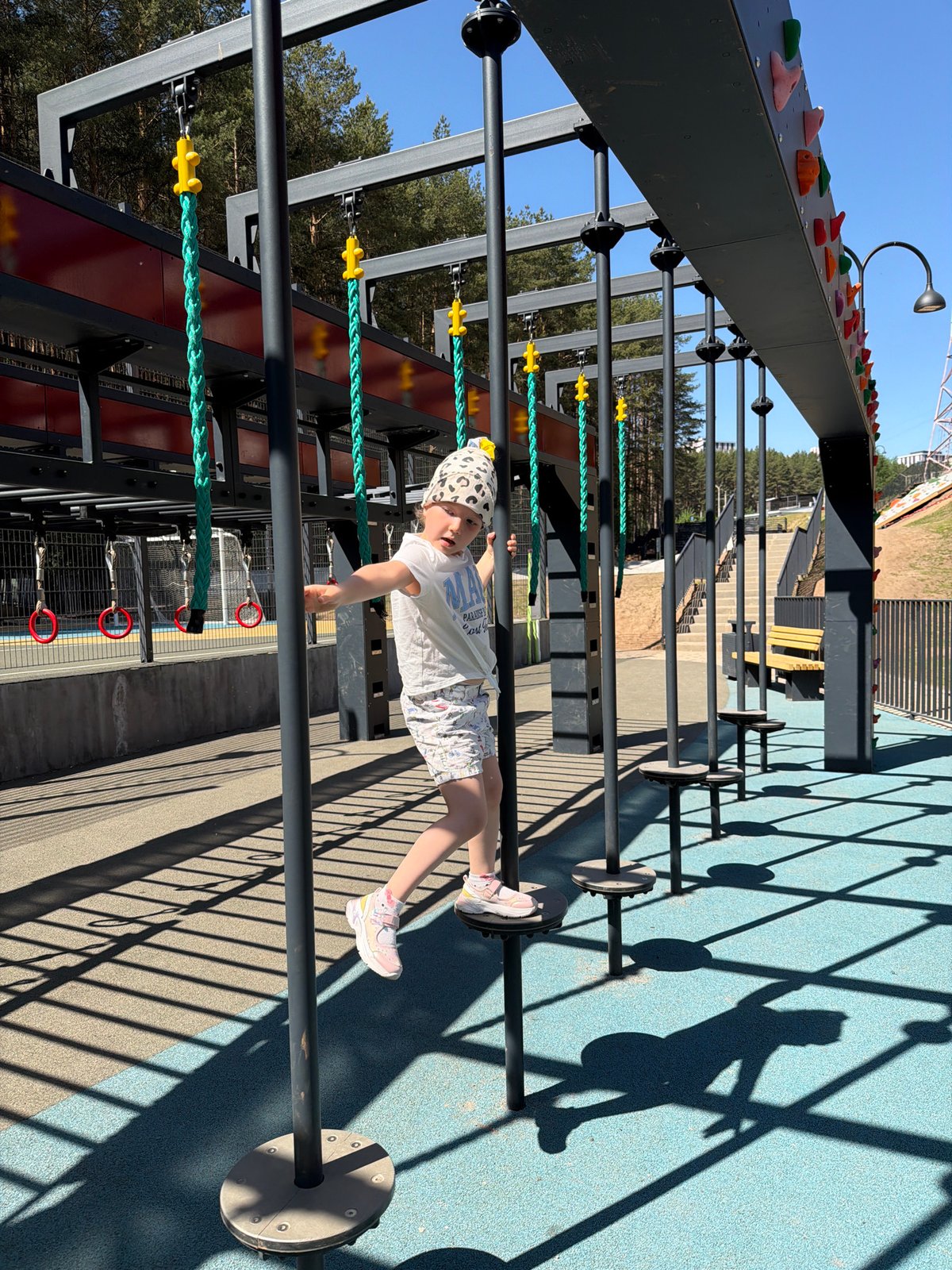 Children play at Izhevsk playground during morning hours
