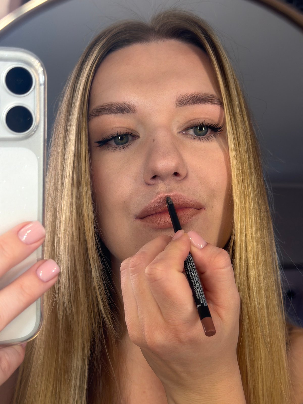 Woman's morning beauty routine captured in Dreiliņi, Latvia