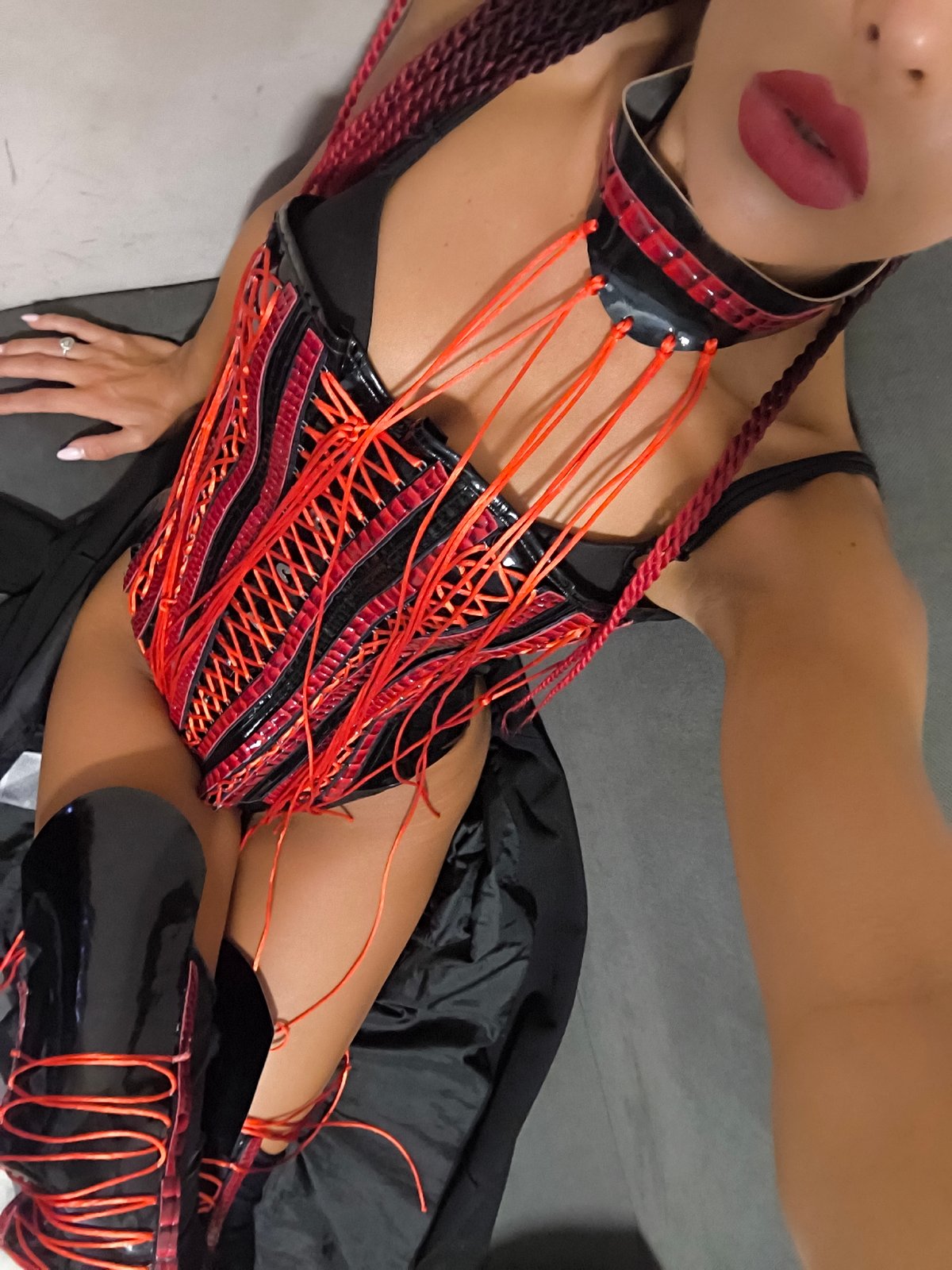 Black and red corset look, shot from two angles