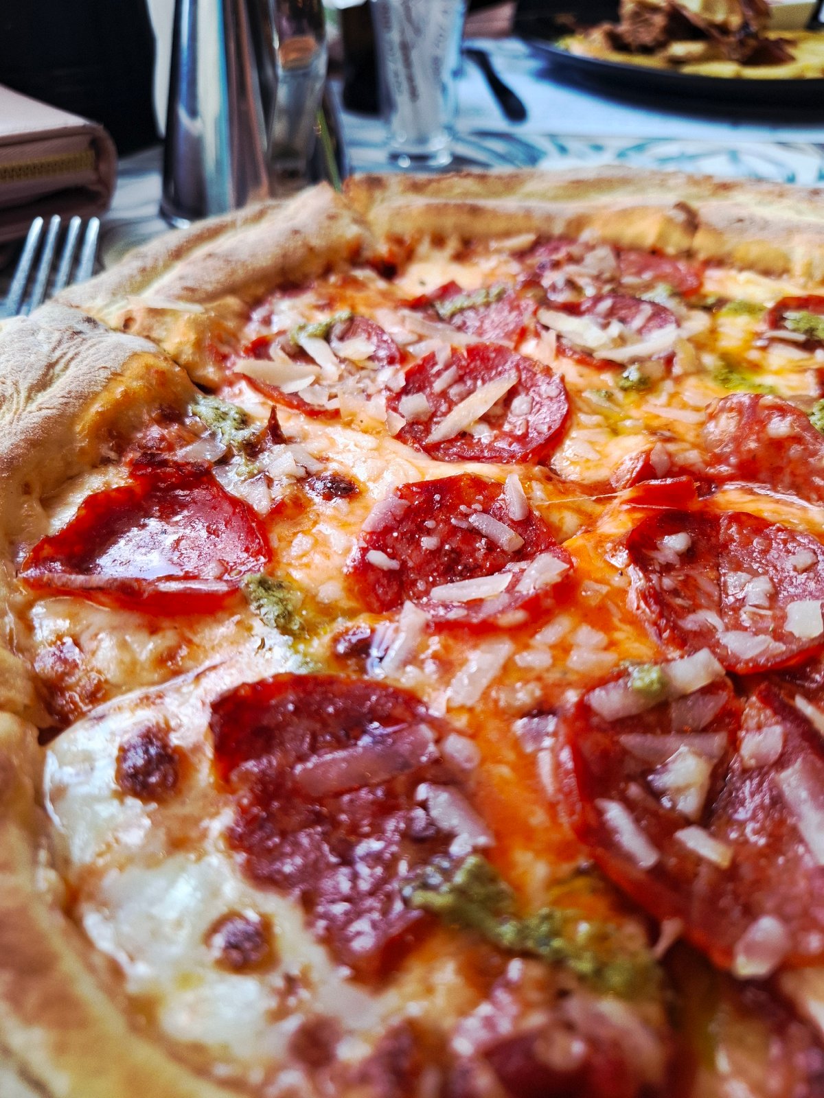Pepperoni pesto pizza documented at unknown location