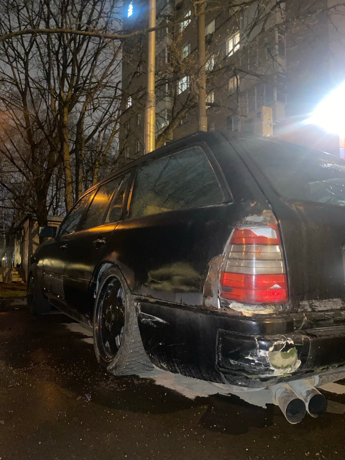 Damaged black car spotted parked on Moscow street