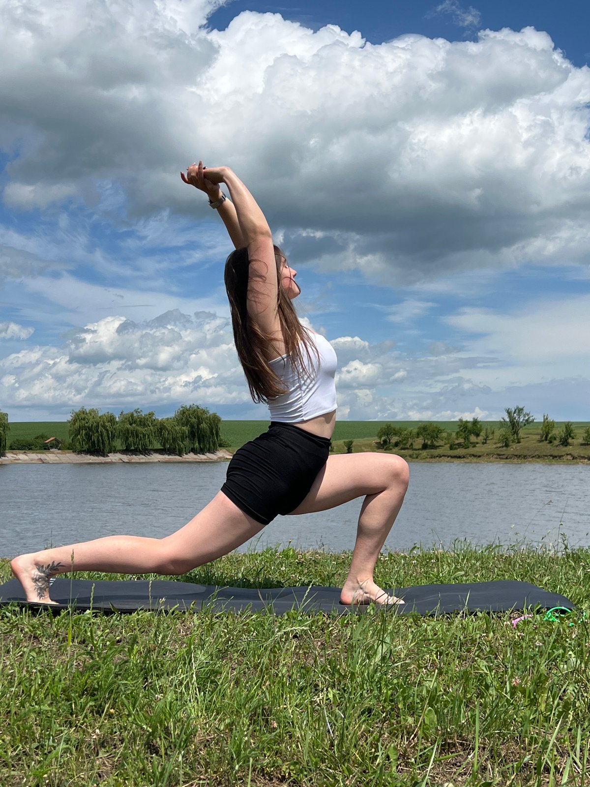 Morning yoga and fishing session by Ukrainian lake