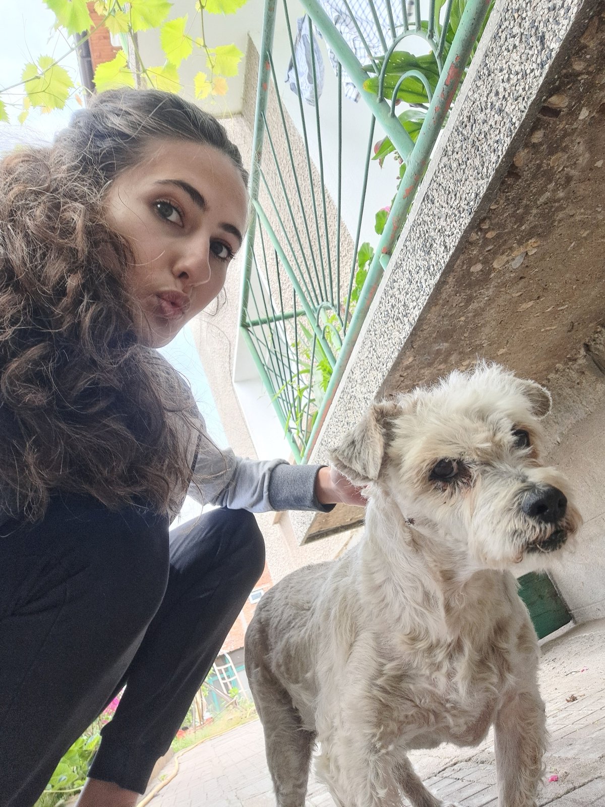 Woman's casual day captured in selfies with pets