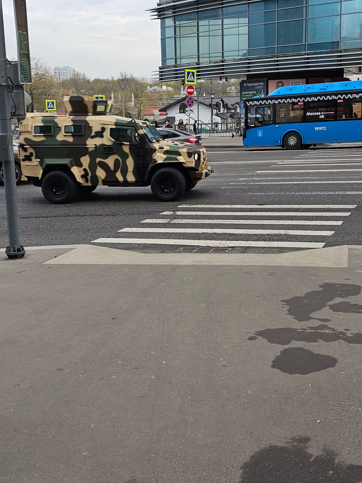 Moscow bus spotted near glass building in Khimki