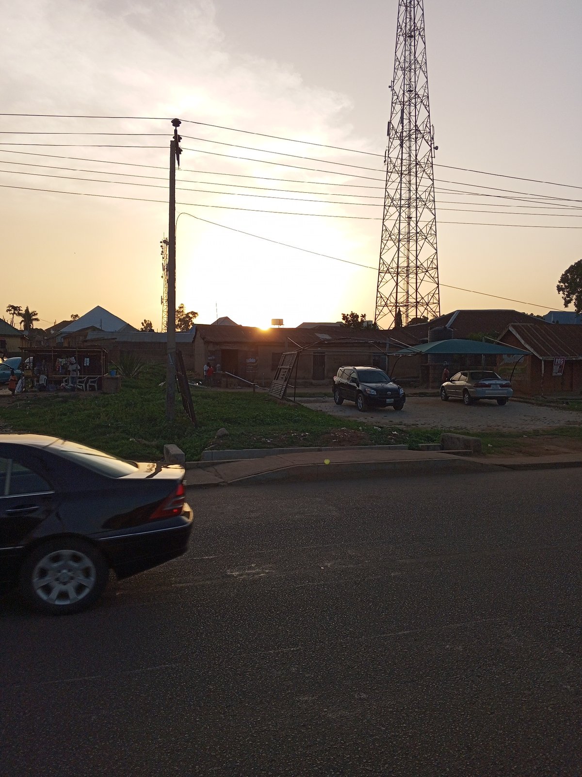 Urban street scenes with vendors, music setup documented