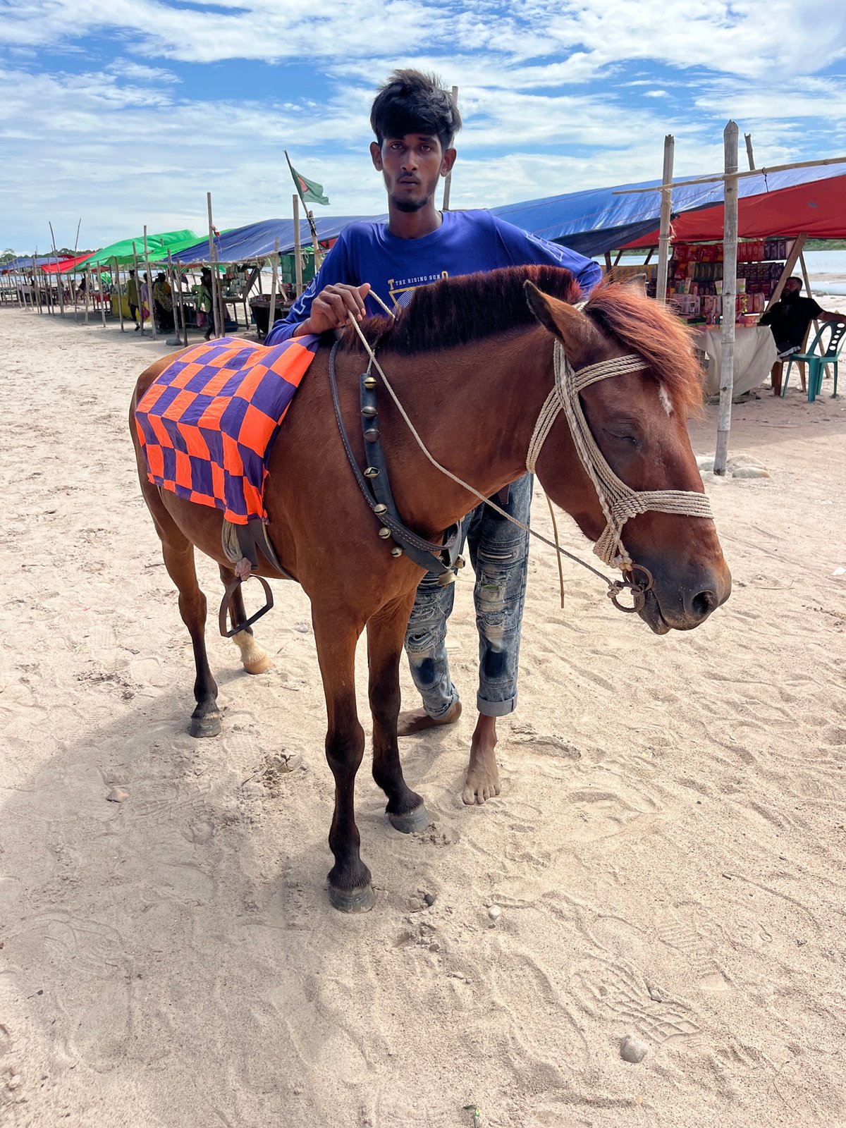 Horses and beach scenes along the Bangladesh-India border