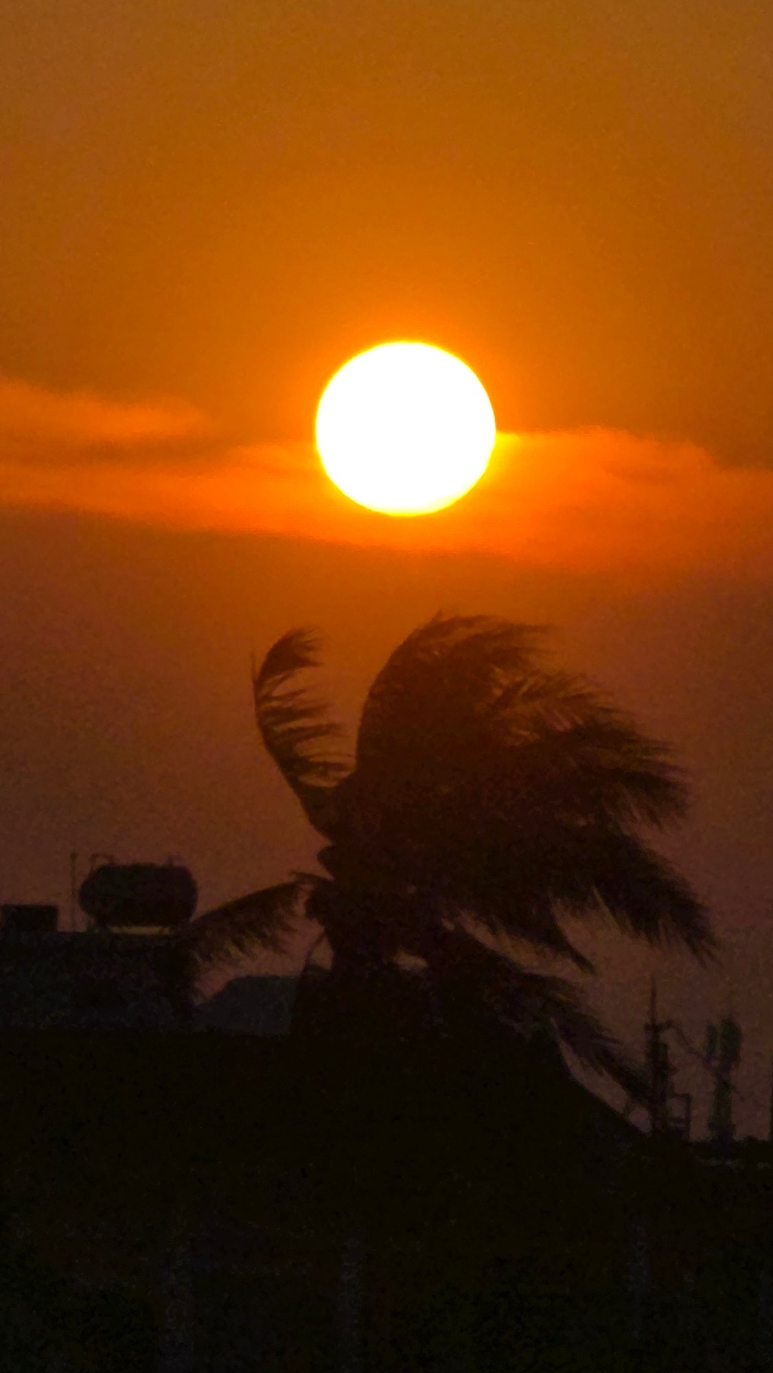 Orange sunset captured over Nha Trang waterfront
