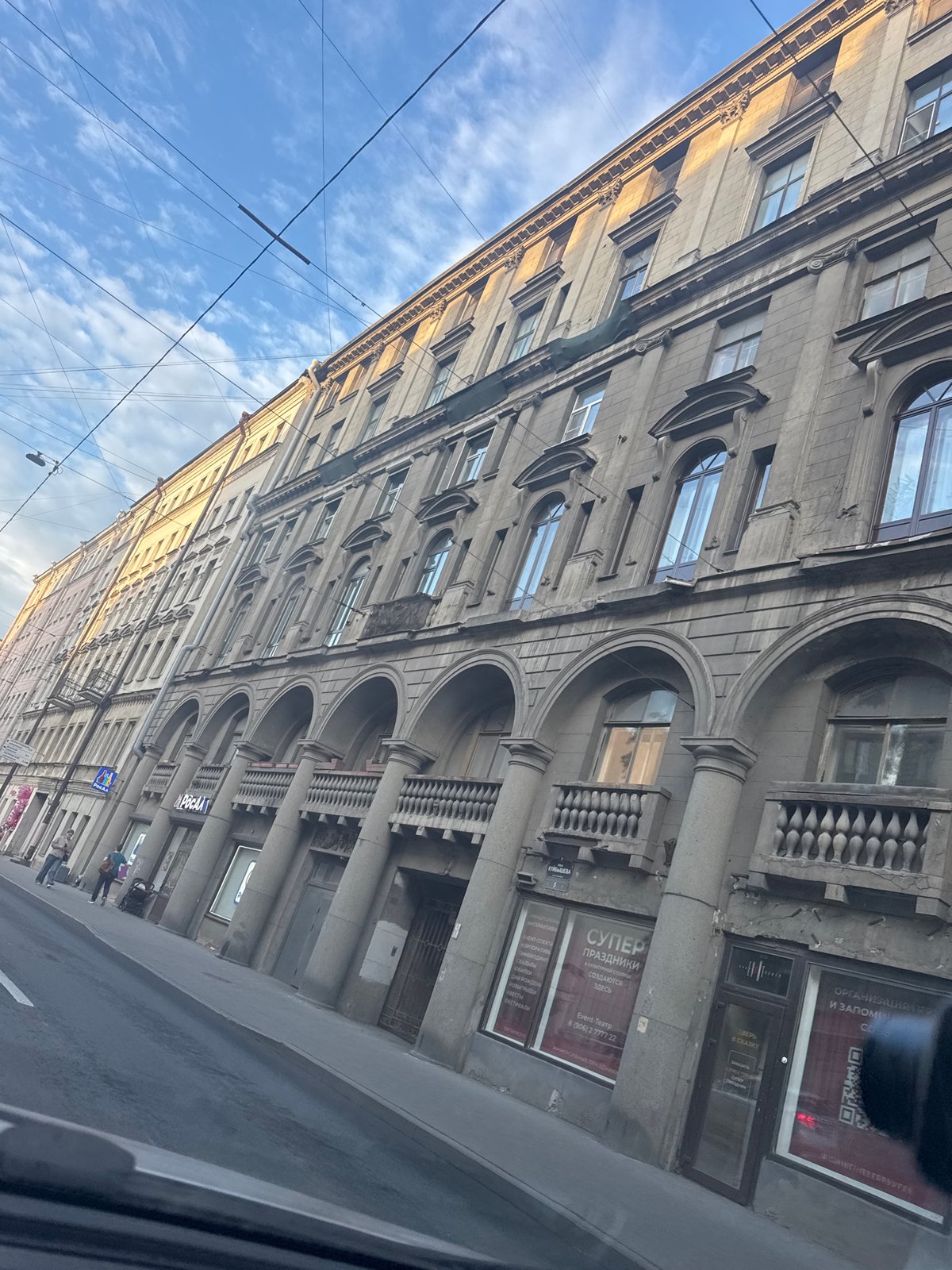 Tourist captures Saint Petersburg street scenes, tram, parks during evening stroll