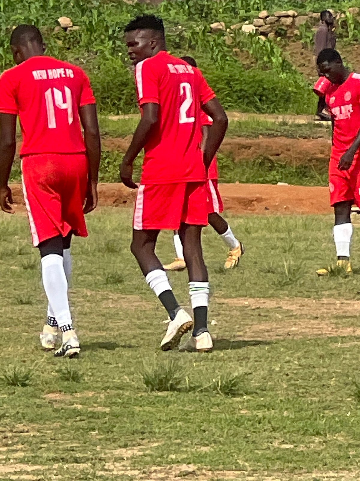 New Hope FC and rivals train on a Jos pitch