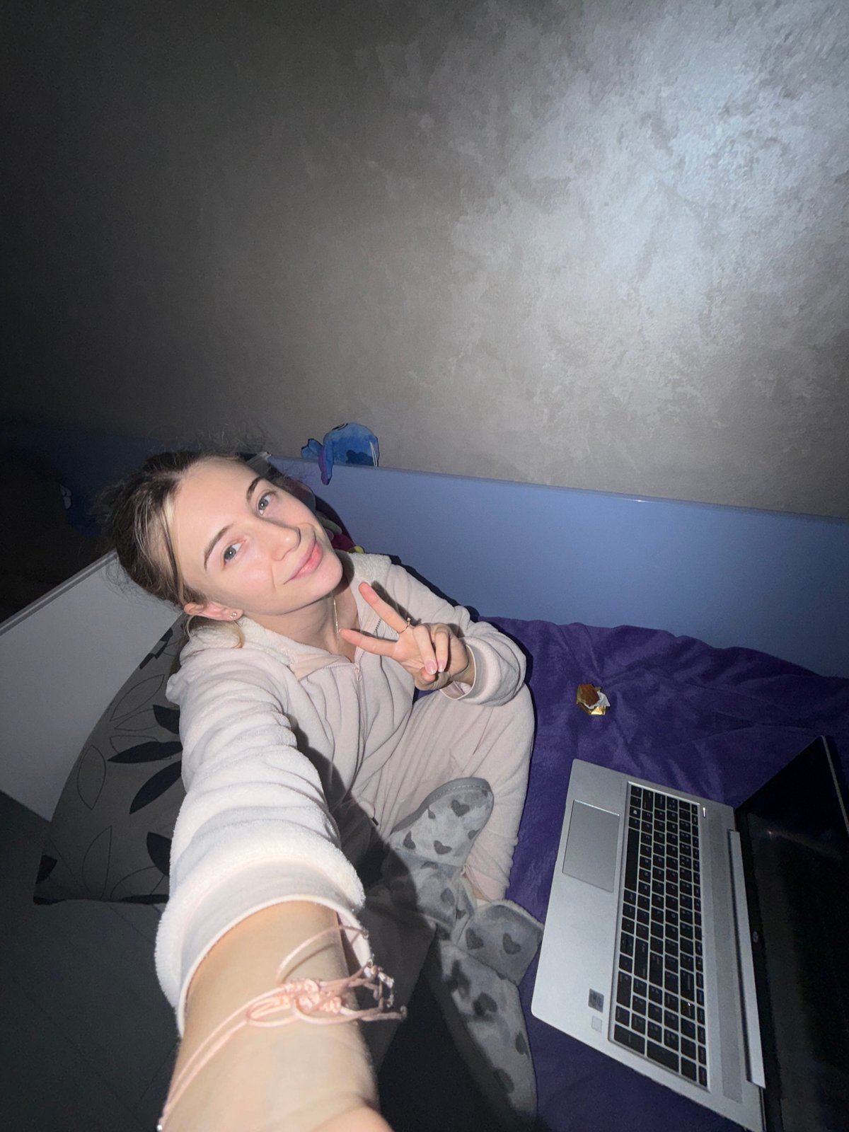 Young couple takes playful selfies indoors in Plovdiv