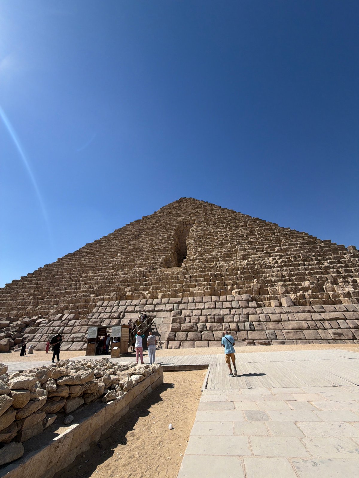 Morning at the Giza pyramids: stones, souvenirs, and camels