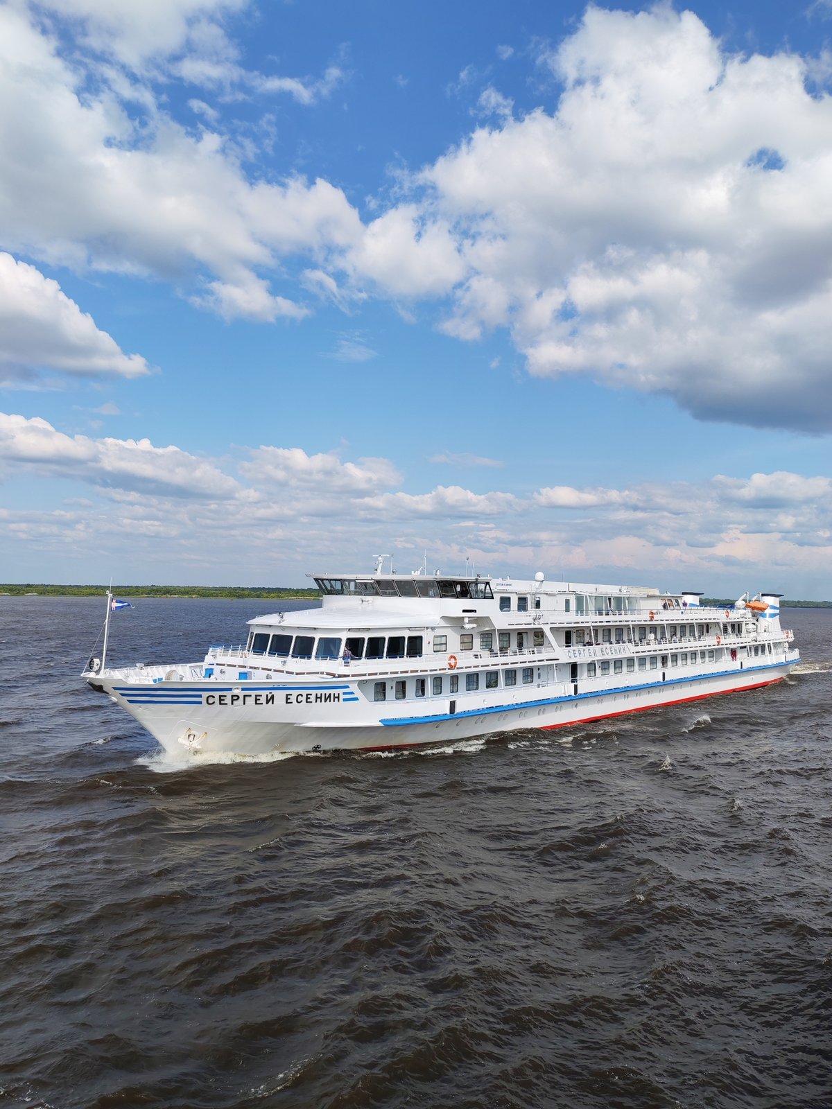 Cruise ship Sergei Yesenin sailing past Krokhino on the river