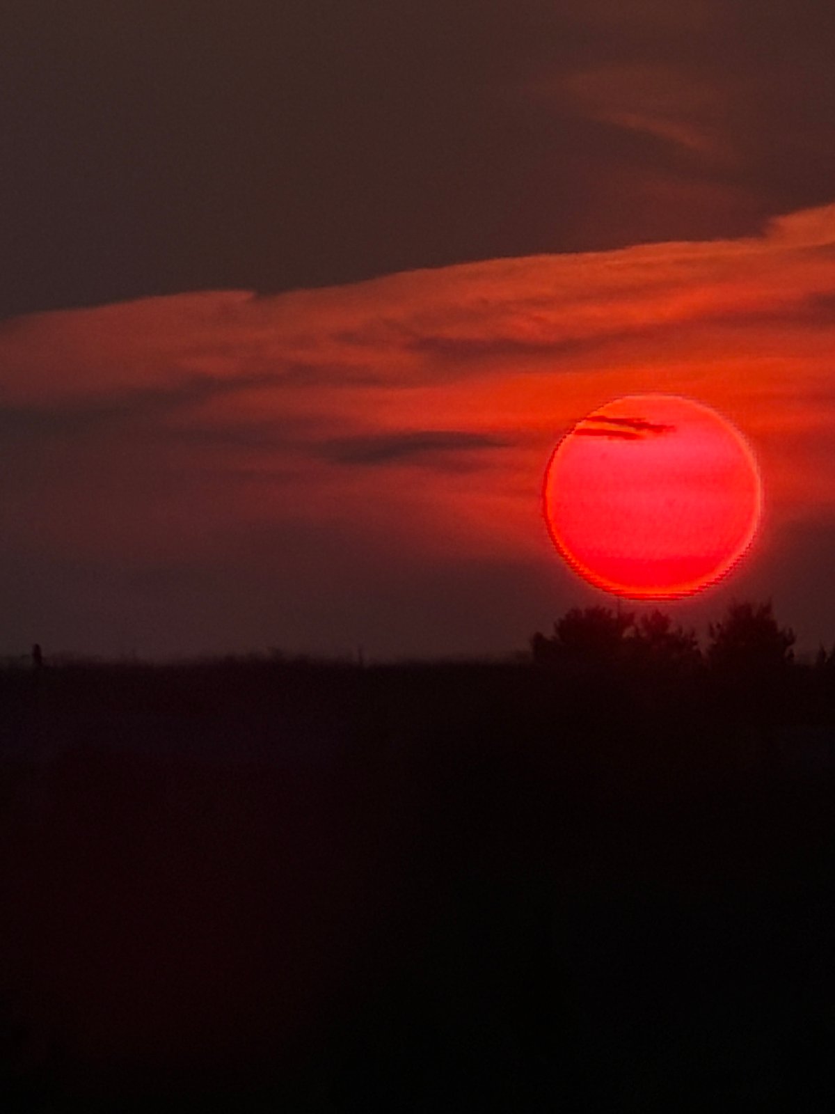 Vivid summer sunset over rural Foki, Russia